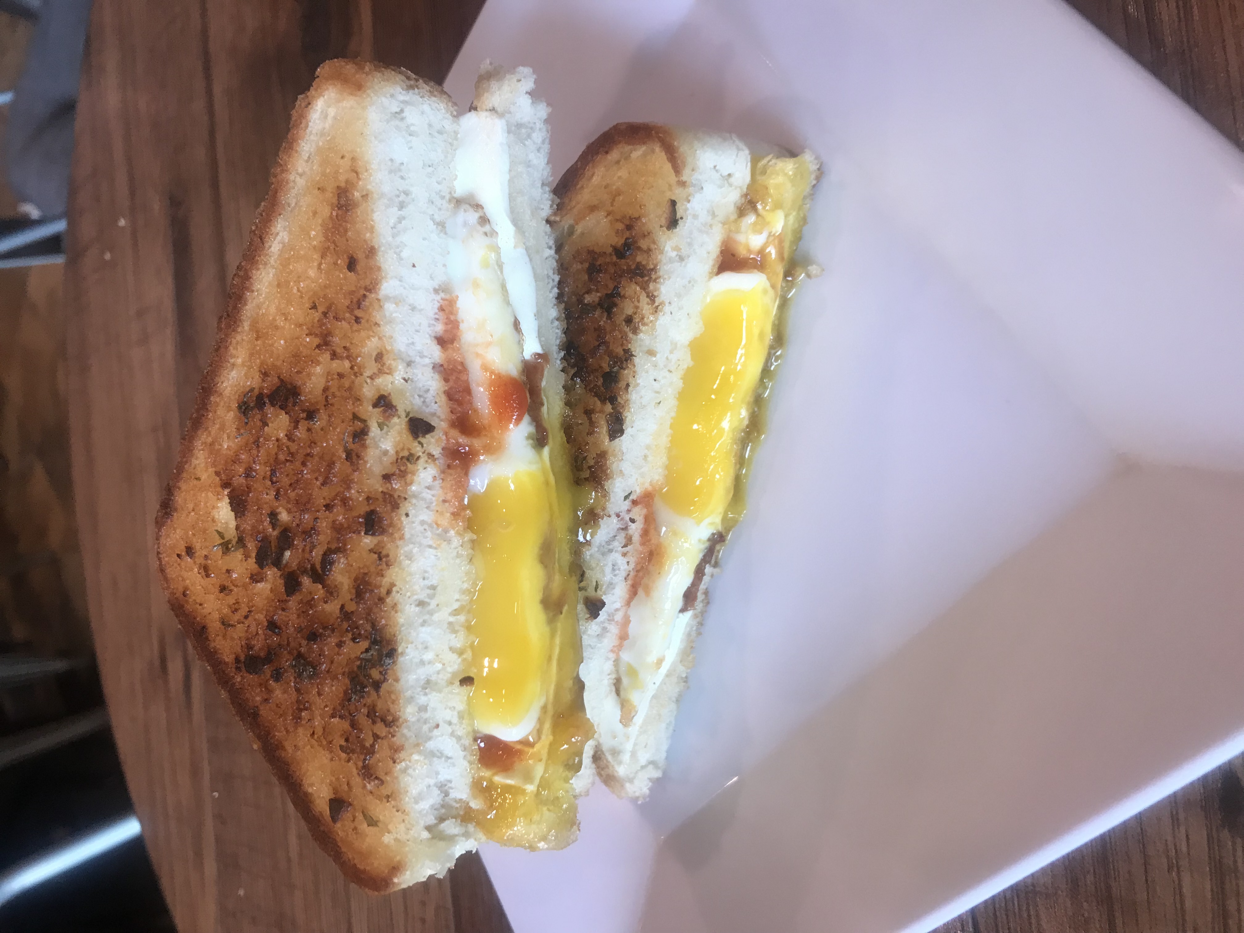 Order Siracha Egg sandwich food online from Cafe via espresso store, Astoria on bringmethat.com