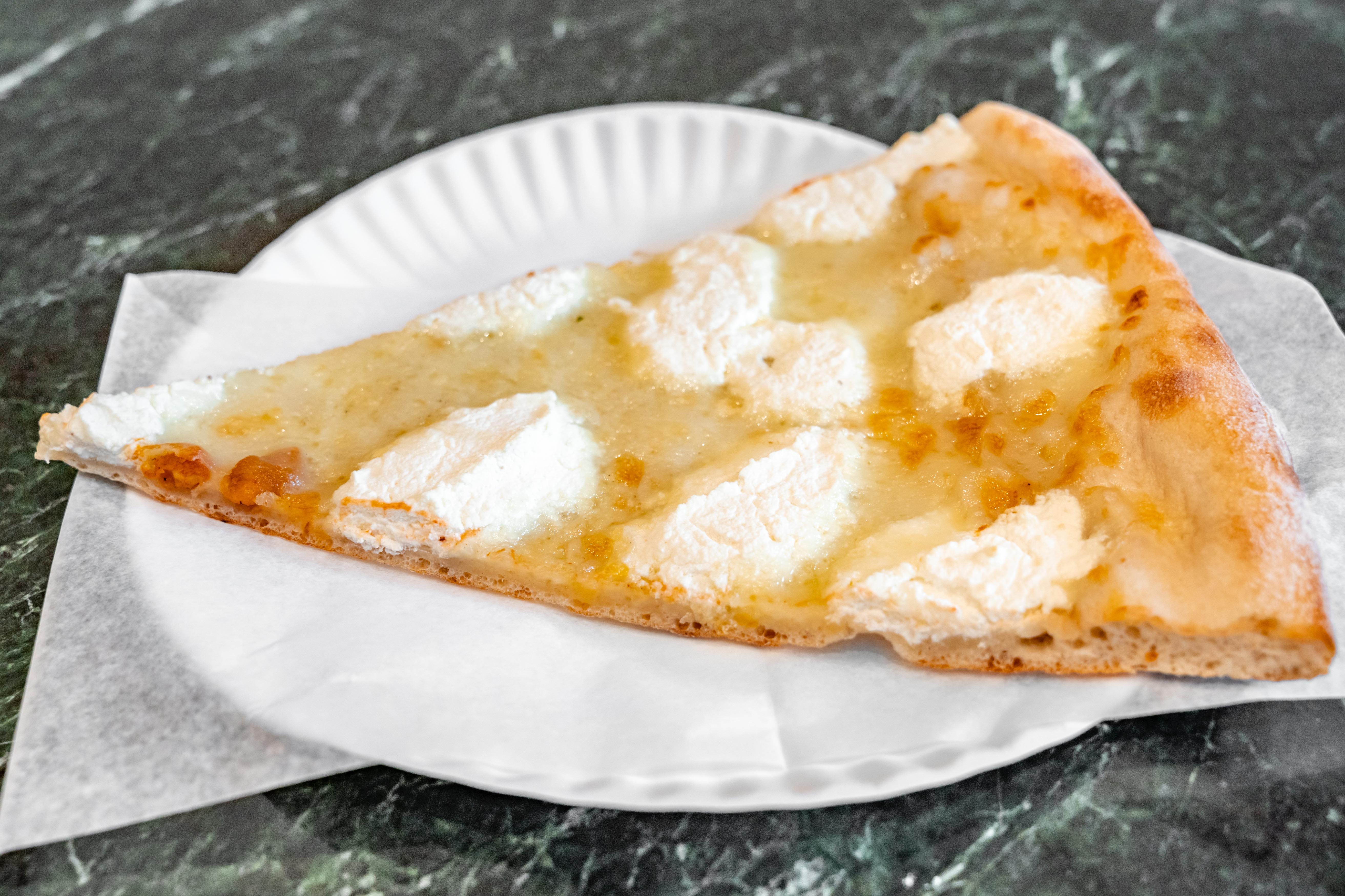 Order White Pizza - Personal 12" food online from Taste Of Italy store, Astoria on bringmethat.com