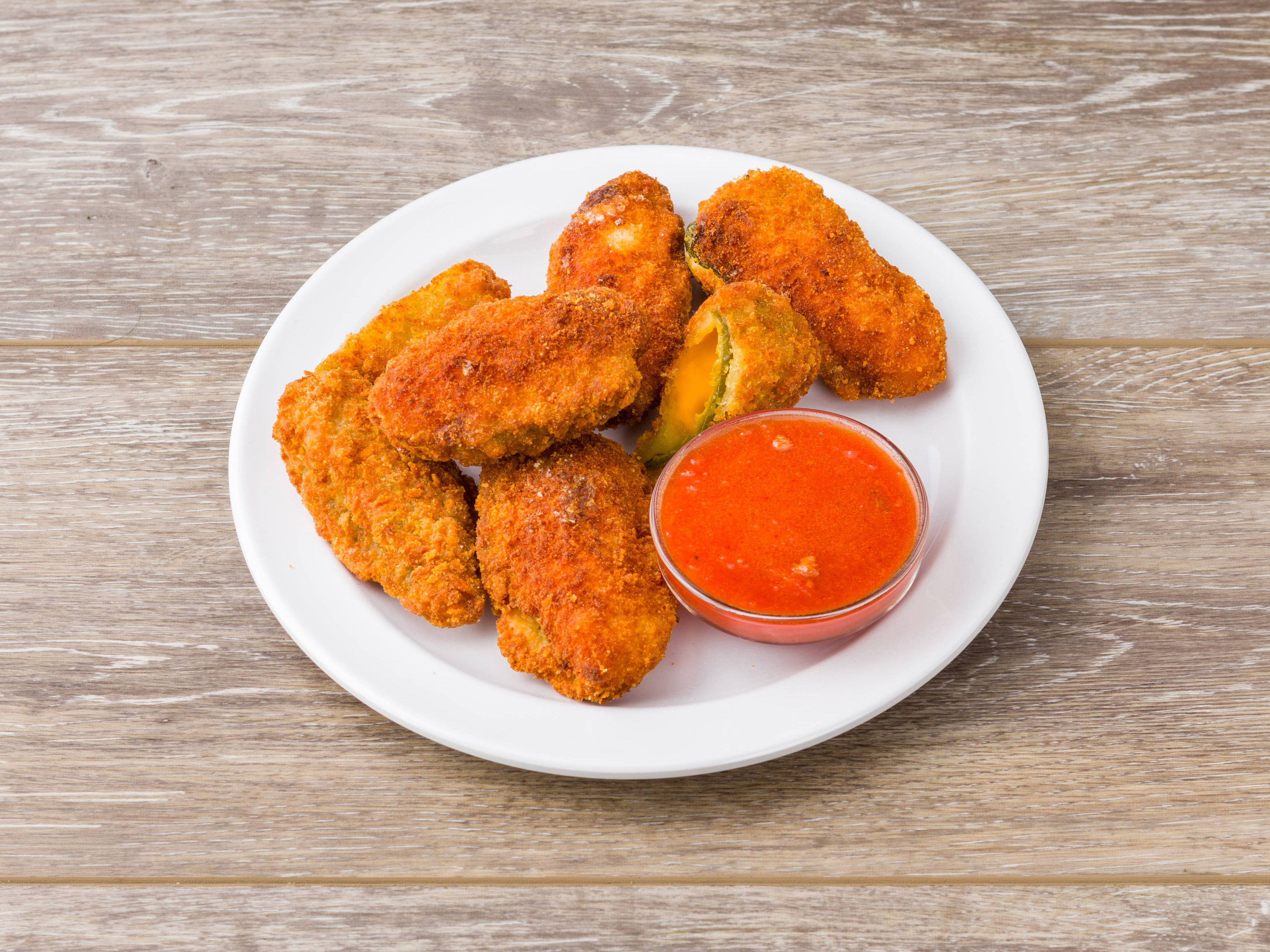 Order Jalapeno Poppers food online from Wings to Go store, Hoboken on bringmethat.com