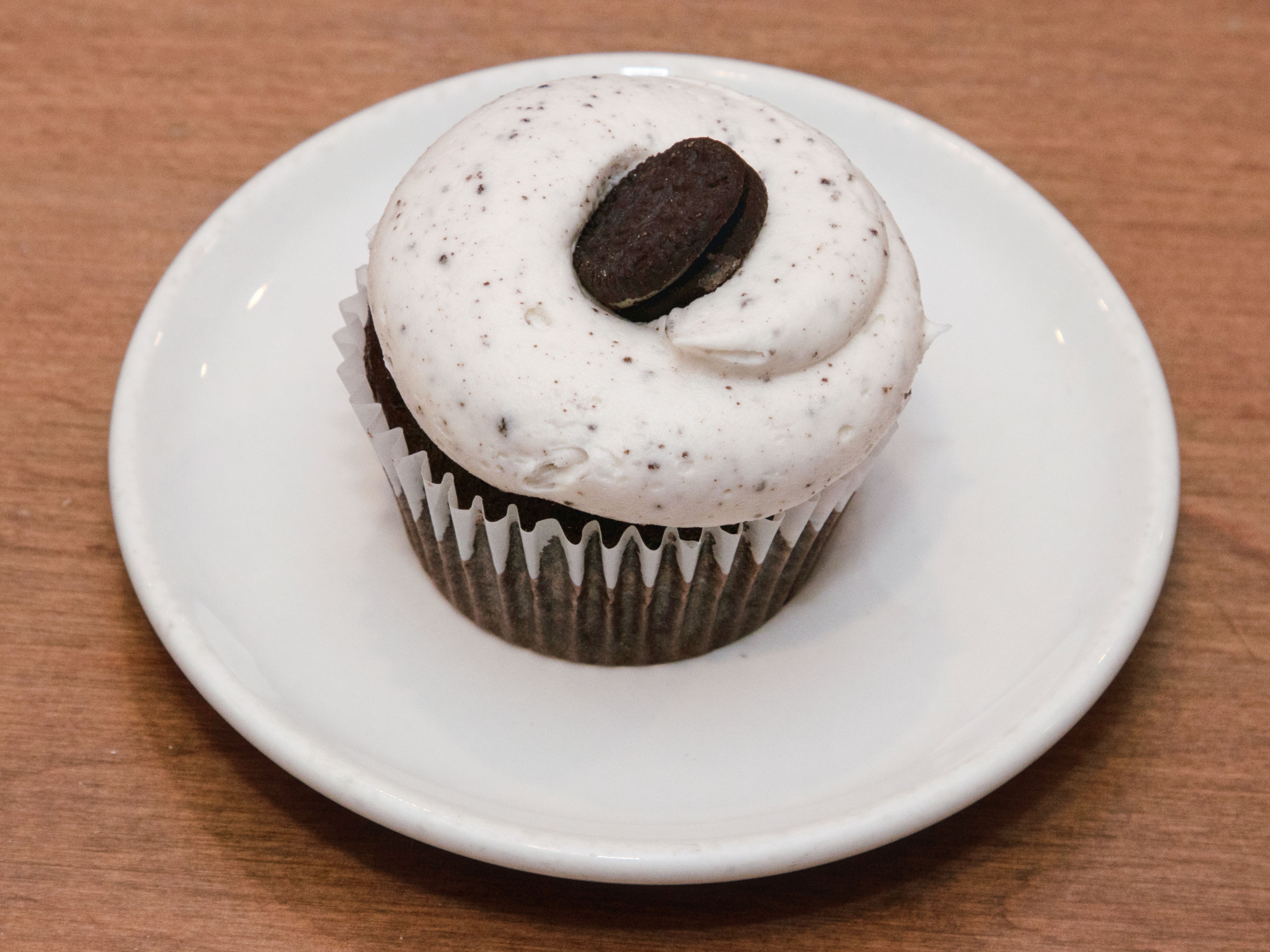 Order Chocolate Cupcake with Vanilla Oreo Frosting food online from The Cakeroom store, Washington on bringmethat.com