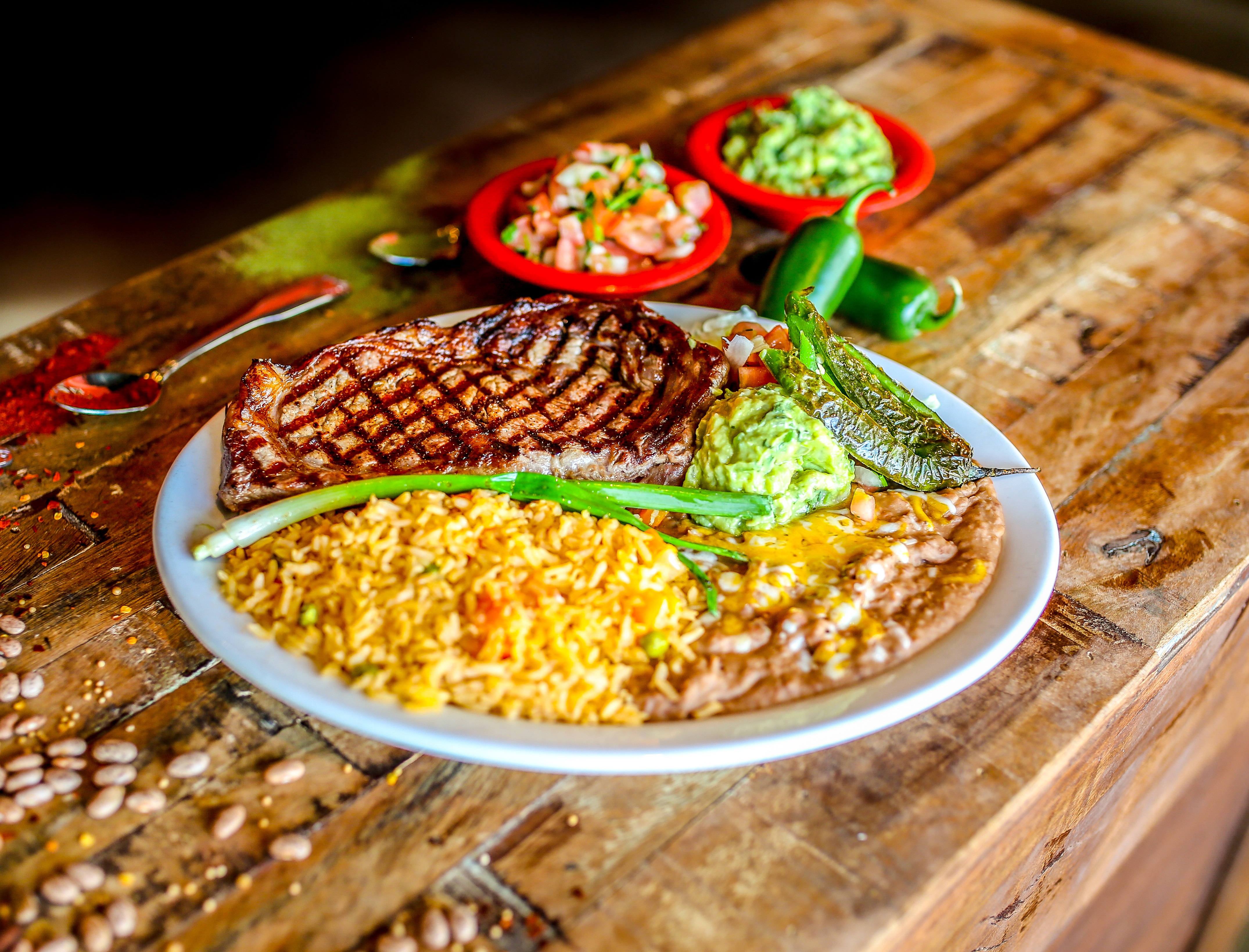 Order Carne Asada food online from Miguels Mexican Bar And Grill store, Colorado Springs on bringmethat.com