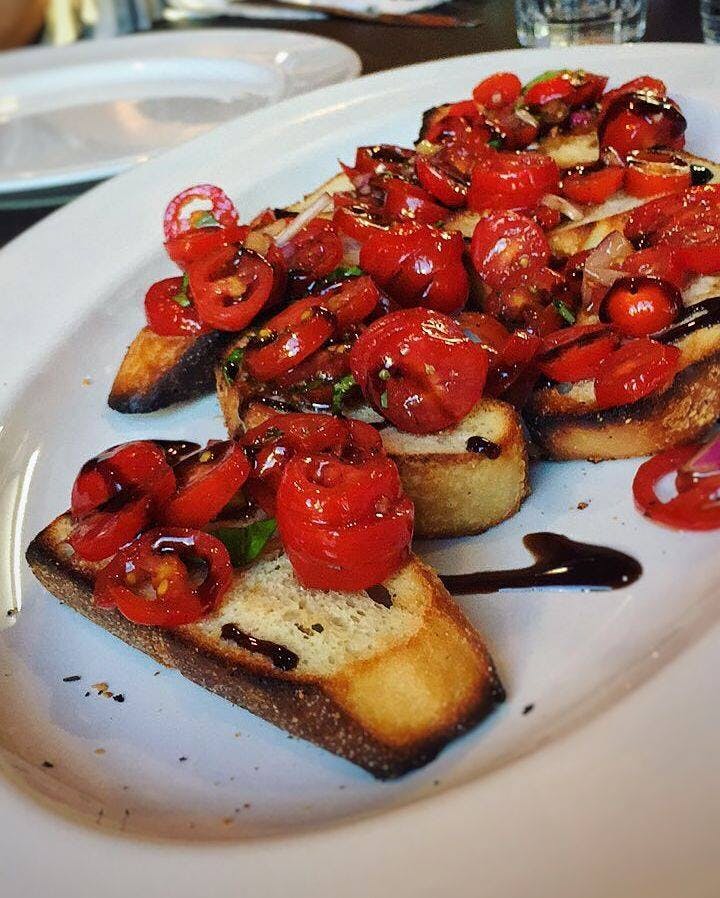 Order Bruschetta - Appetizer food online from Mario's Famous Pizza store, Elizabeth on bringmethat.com
