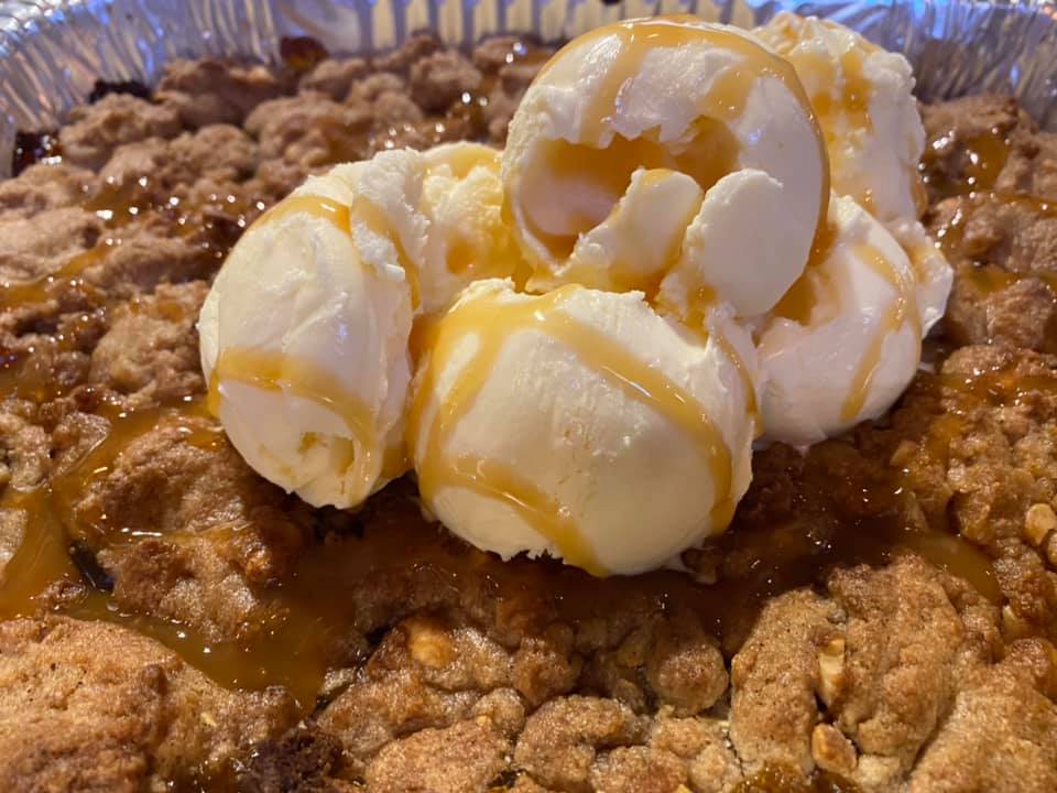 Order Apple and Caramel Cobbler food online from Holy Smokes store, Yuma on bringmethat.com