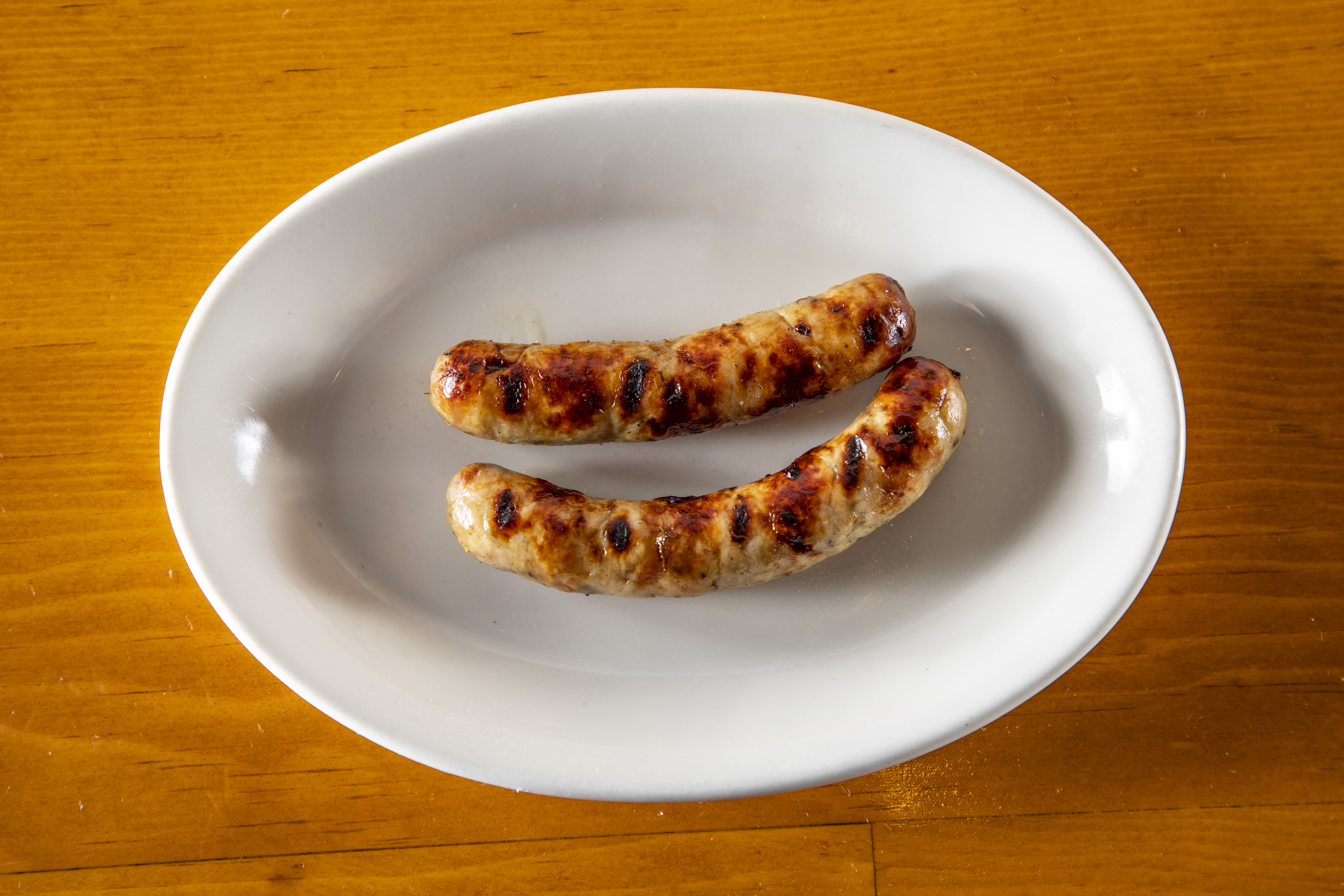 Order 2 Piece Chicken Apple Sausage food online from Pork Store Cafe store, San Francisco on bringmethat.com