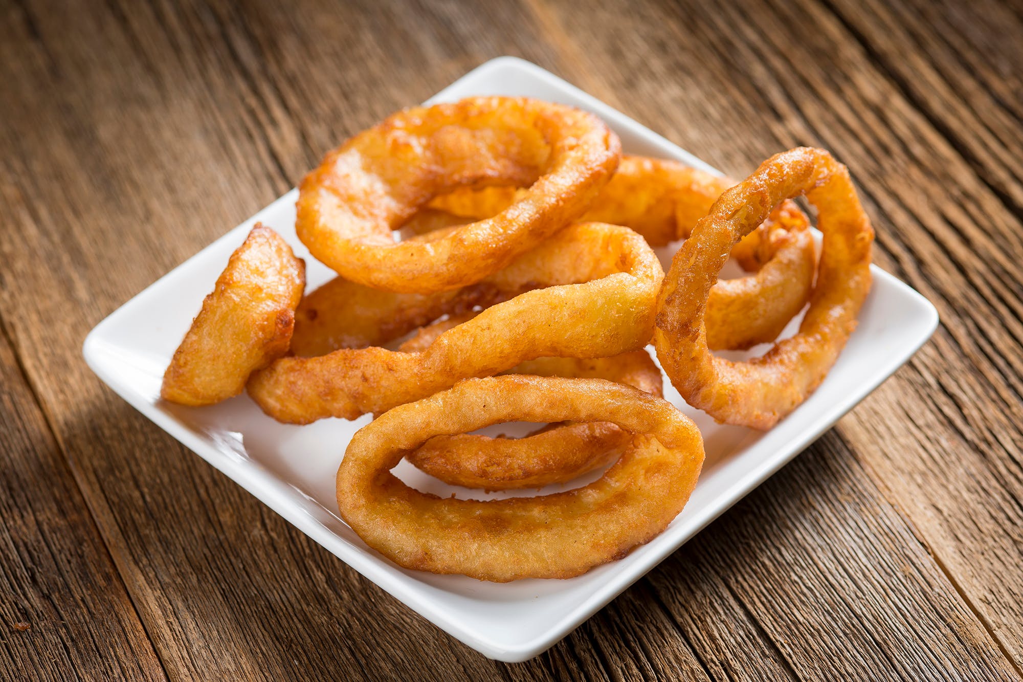 Order Onion Rings - Appetizer food online from Rosati Pizza & Sports Pub store, Cave Creek on bringmethat.com