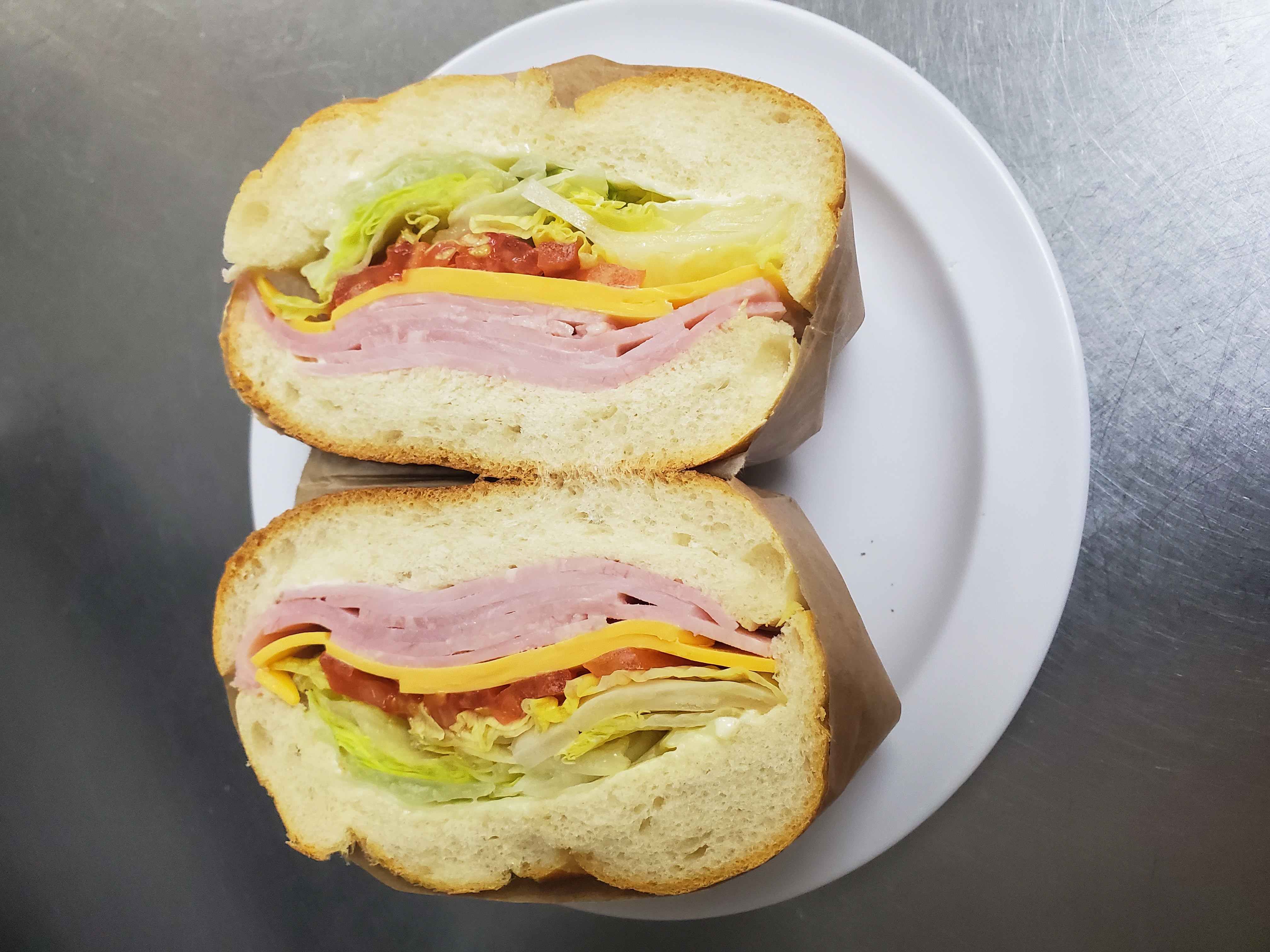 Order Ham & cheese sandwiched  food online from Aminas Cafe store, Bronx on bringmethat.com