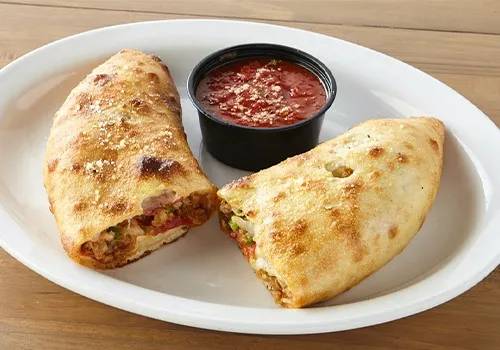 Order Traditional Stromboli food online from Johnny's New York Style Pizza store, Dallas on bringmethat.com