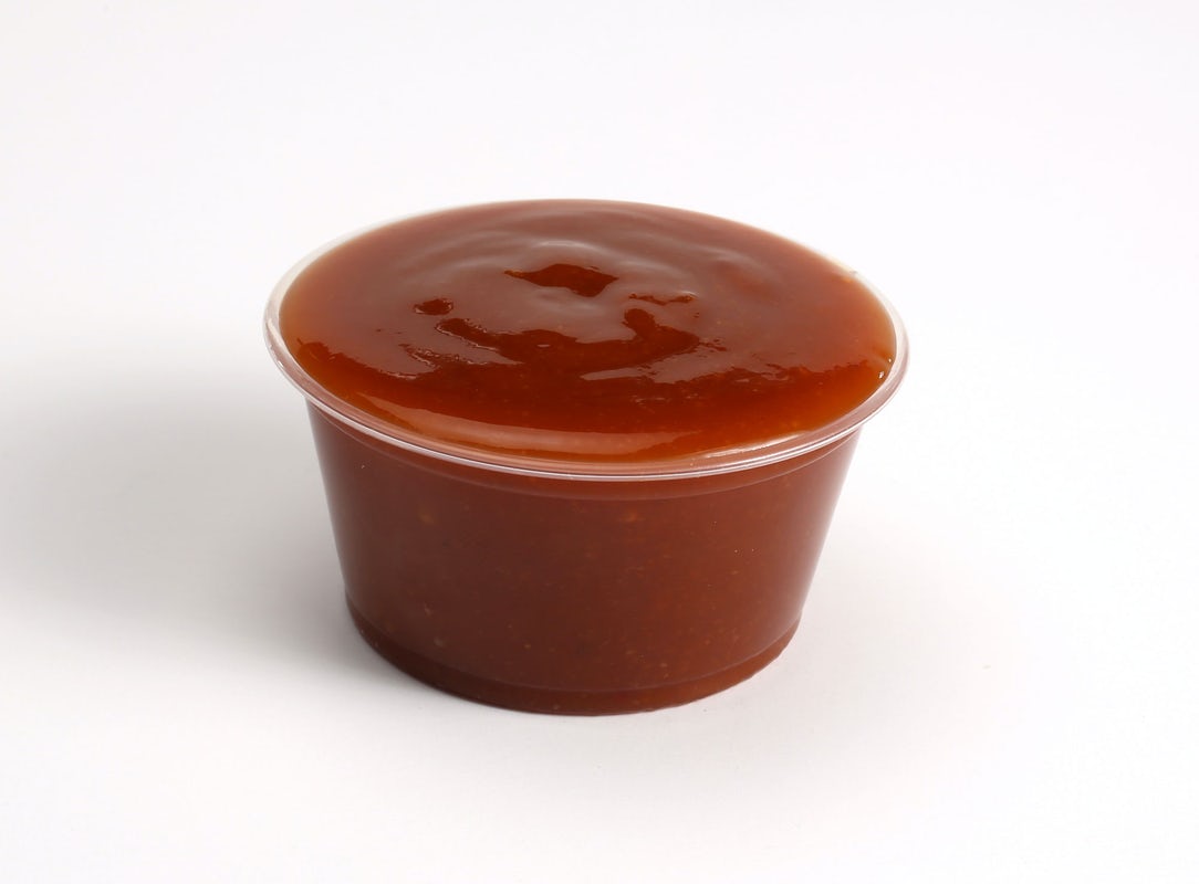 Order Sriracha Garlic food online from Slim Chickens store, Humble on bringmethat.com