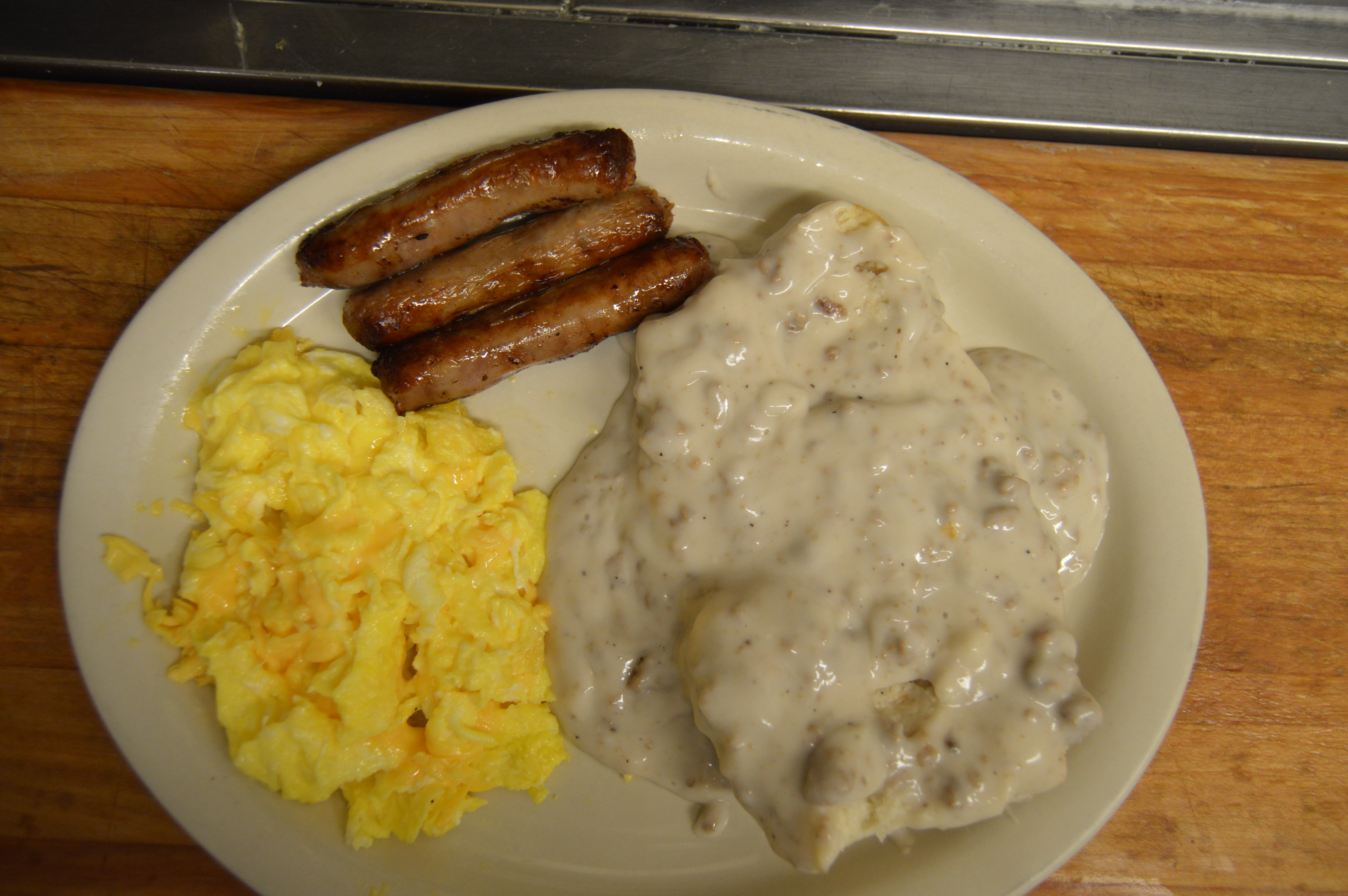 Order Homemade Sausage Gravy with Biscuit Breakfast food online from Angelas Family Restaurant store, Cleveland on bringmethat.com