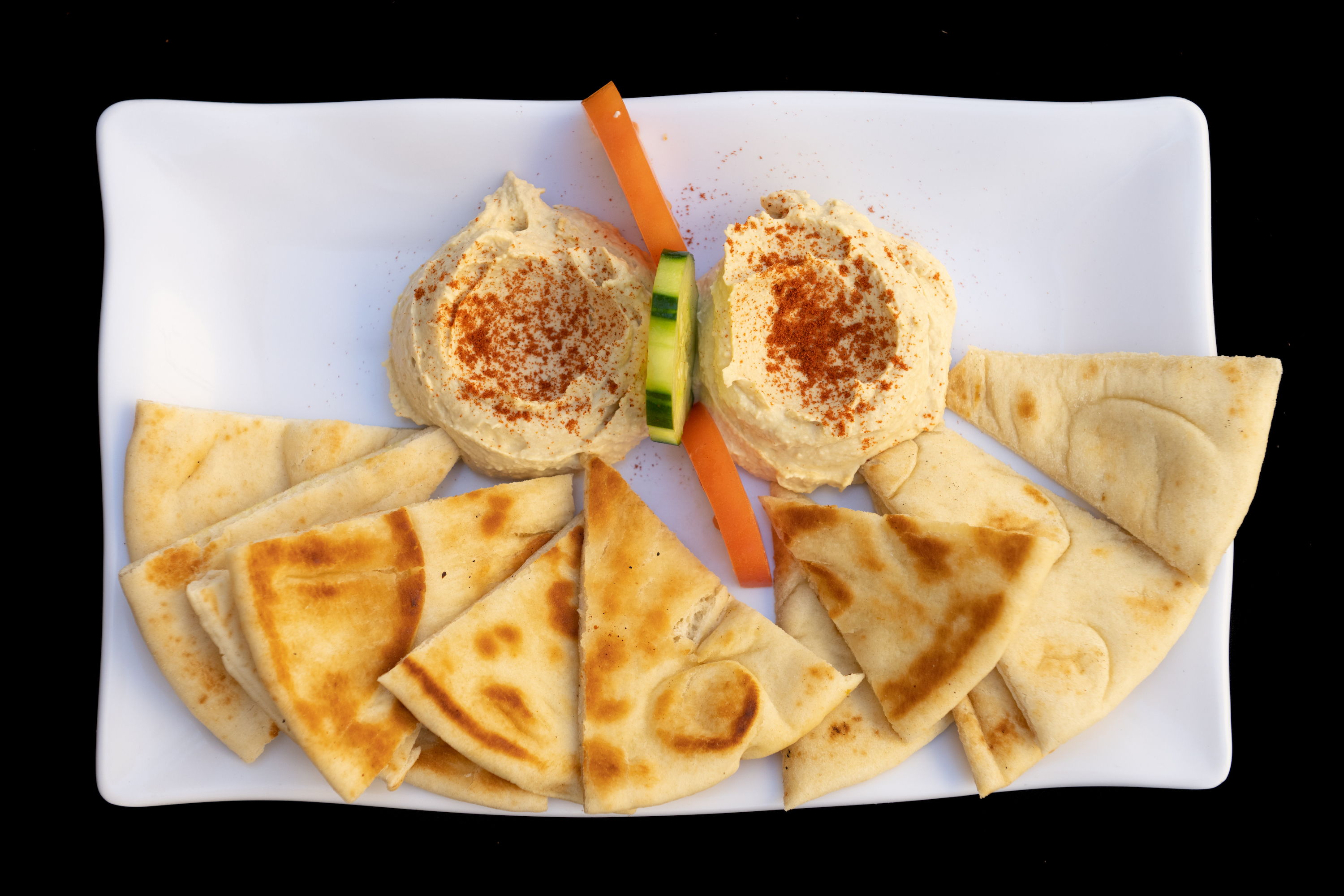 Order Hummus food online from Harbor Greek Cafe store, San Diego on bringmethat.com