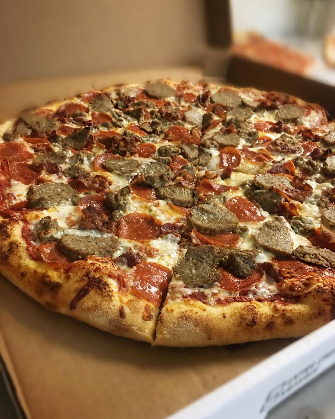 Order Meat Lovers’ Pizza food online from Gaya Pizzeria store, Somerville on bringmethat.com