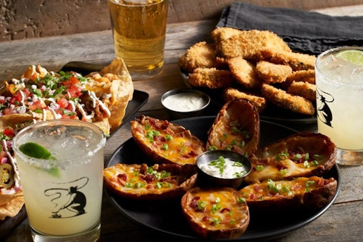 Order Loaded Potato Skins food online from Black Angus Steakhouse store, Bakersfield on bringmethat.com