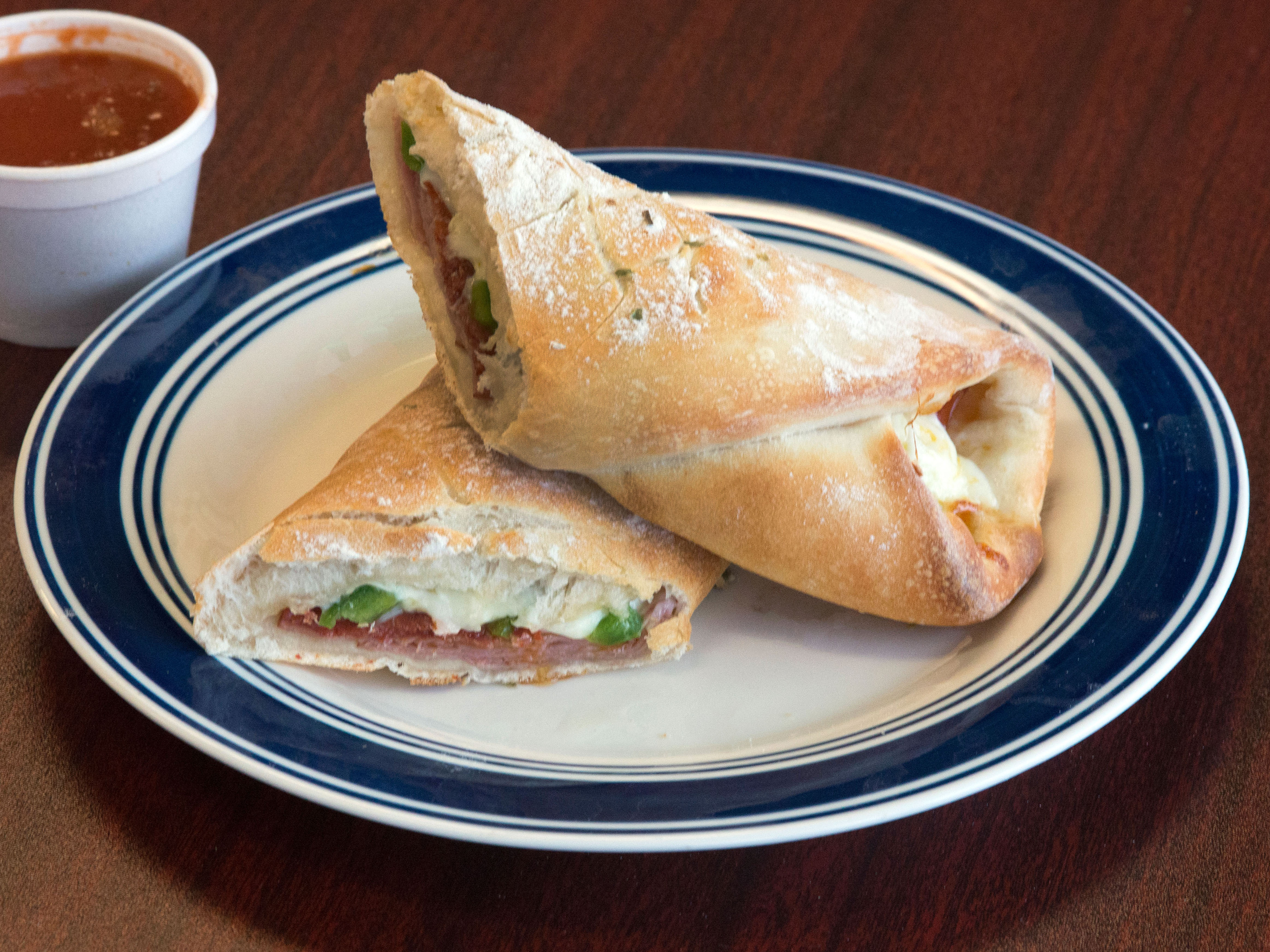 Order Stromboli food online from Milano Pizza store, Albany on bringmethat.com