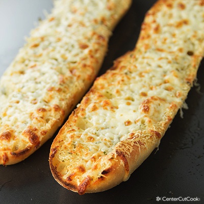 Order Garlic Bread with Cheese food online from Pizza Bolis store, Washington on bringmethat.com