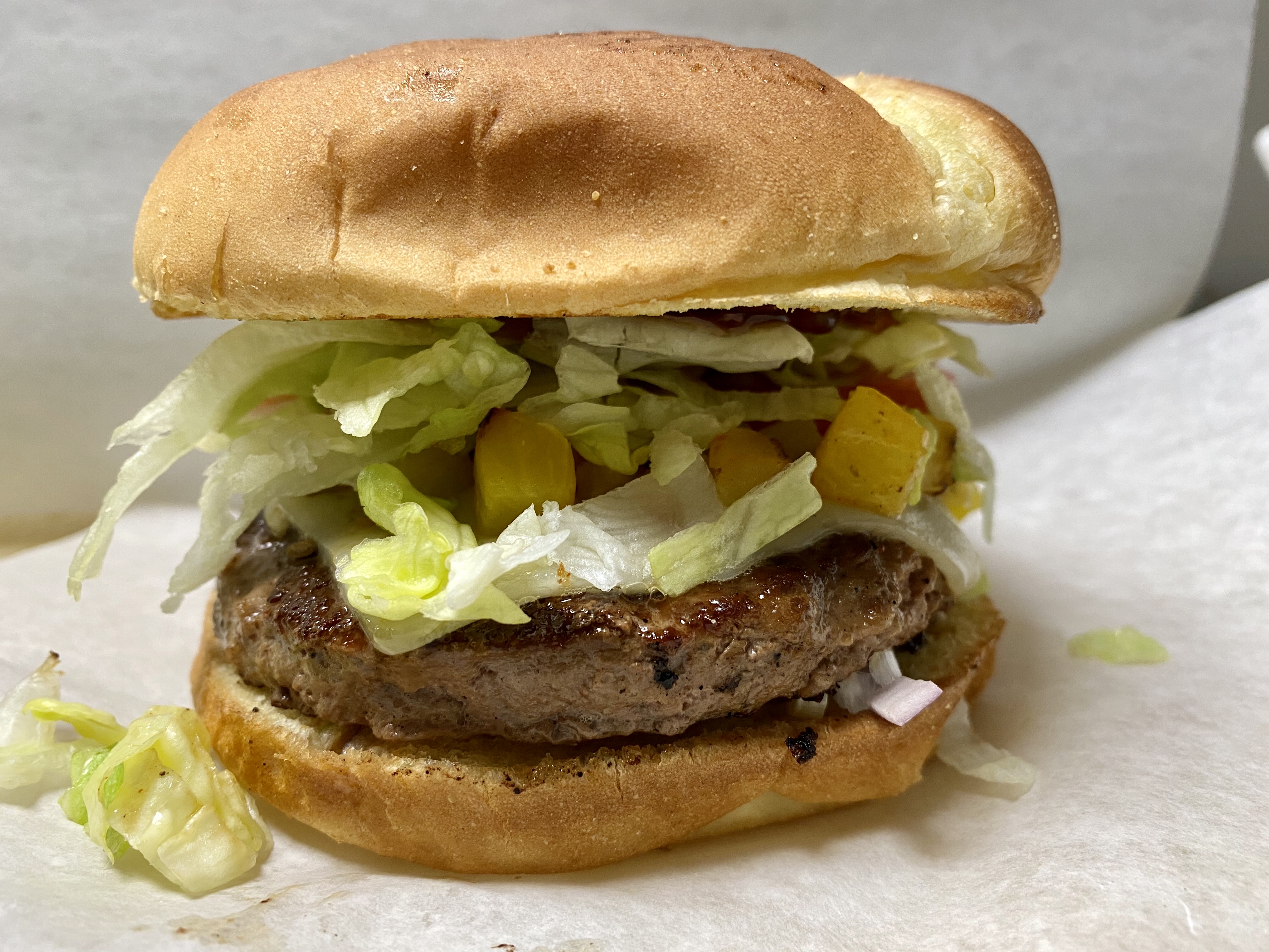Order Hawaiian Burger food online from Omni Deli store, Ontario on bringmethat.com
