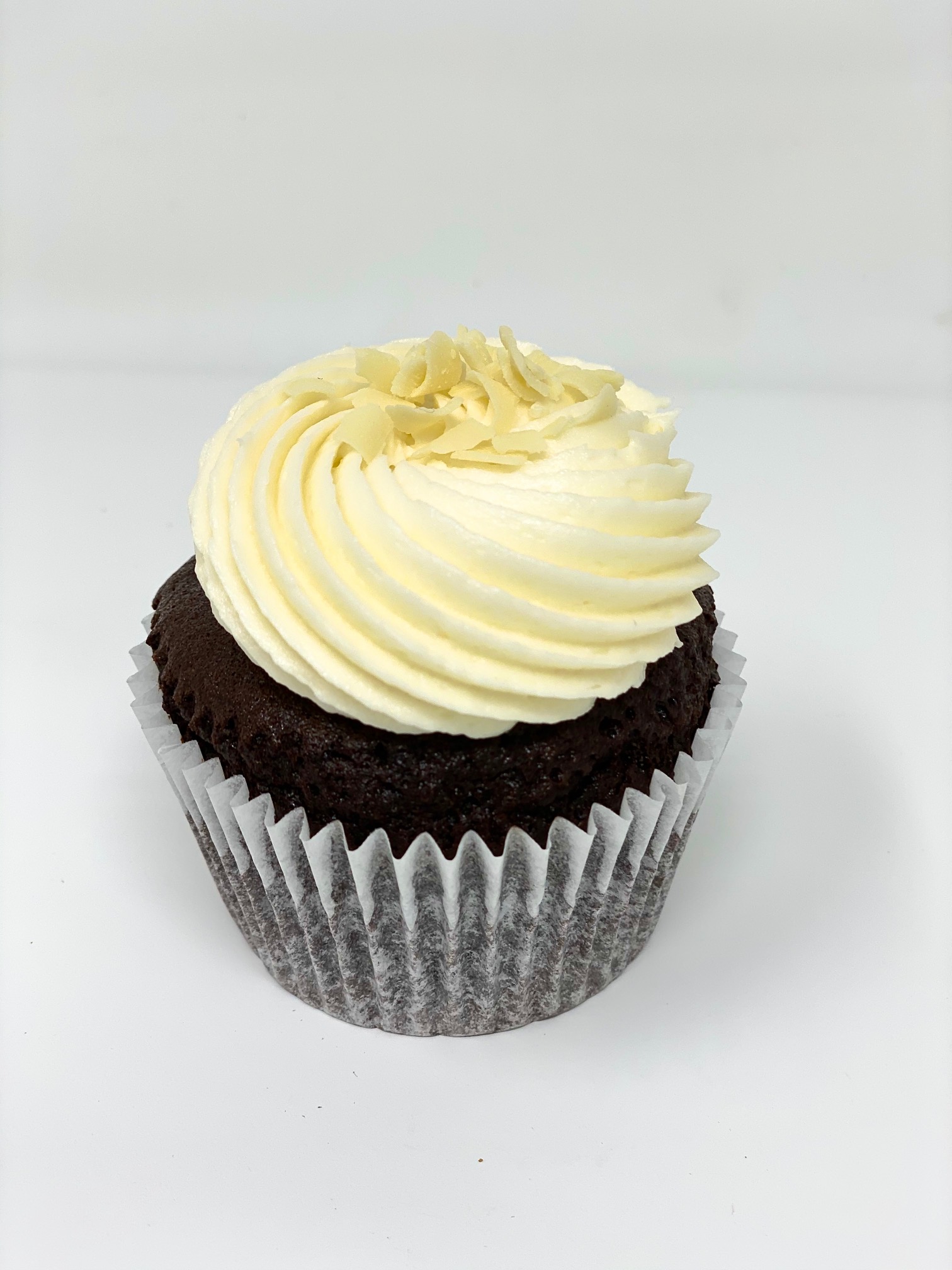 Order Chocolate with Vanilla Cupcake food online from Joy And Sweets store, Culver City on bringmethat.com