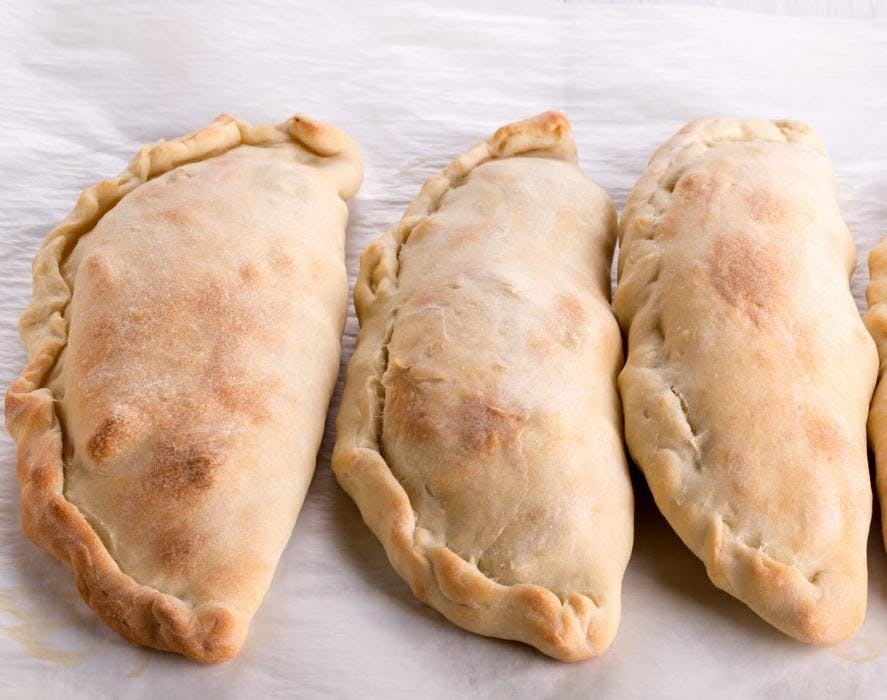 Order Ham Calzone - Calzone food online from De Luca's Pizza store, San Diego on bringmethat.com