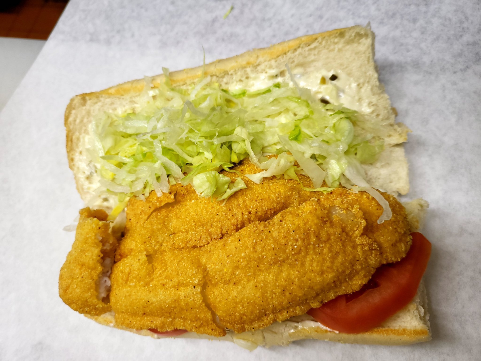 Order Cat Fish Sandwich food online from Rudy's Grill store, Summit Argo on bringmethat.com