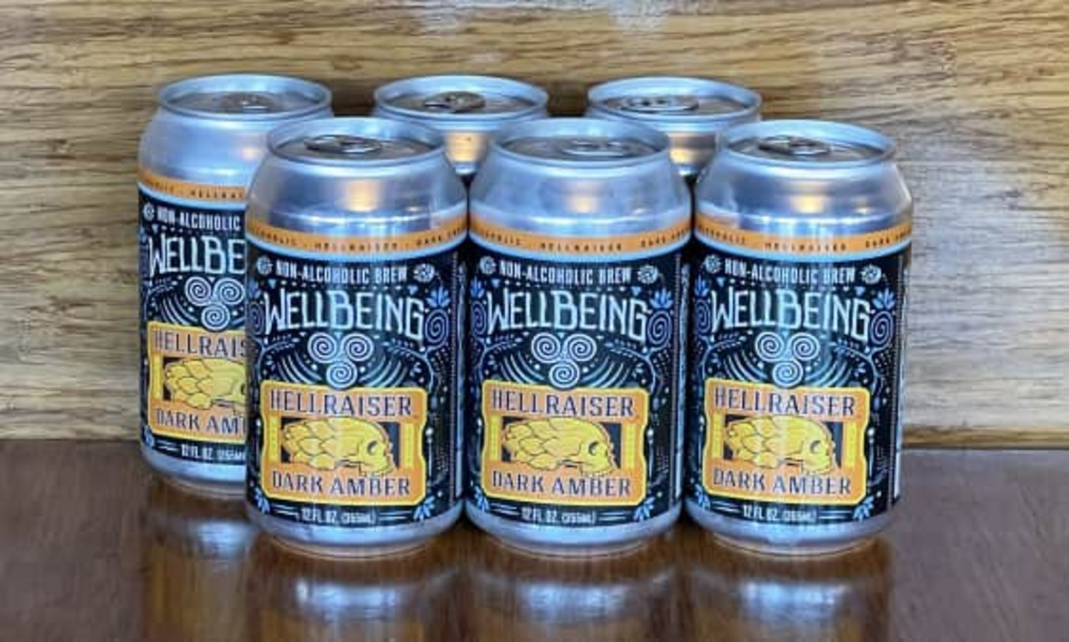 Order Wellbeing Hellraiser Amber - 6pk food online from The Post Sports Bar & Grill store, Creve Coeur on bringmethat.com
