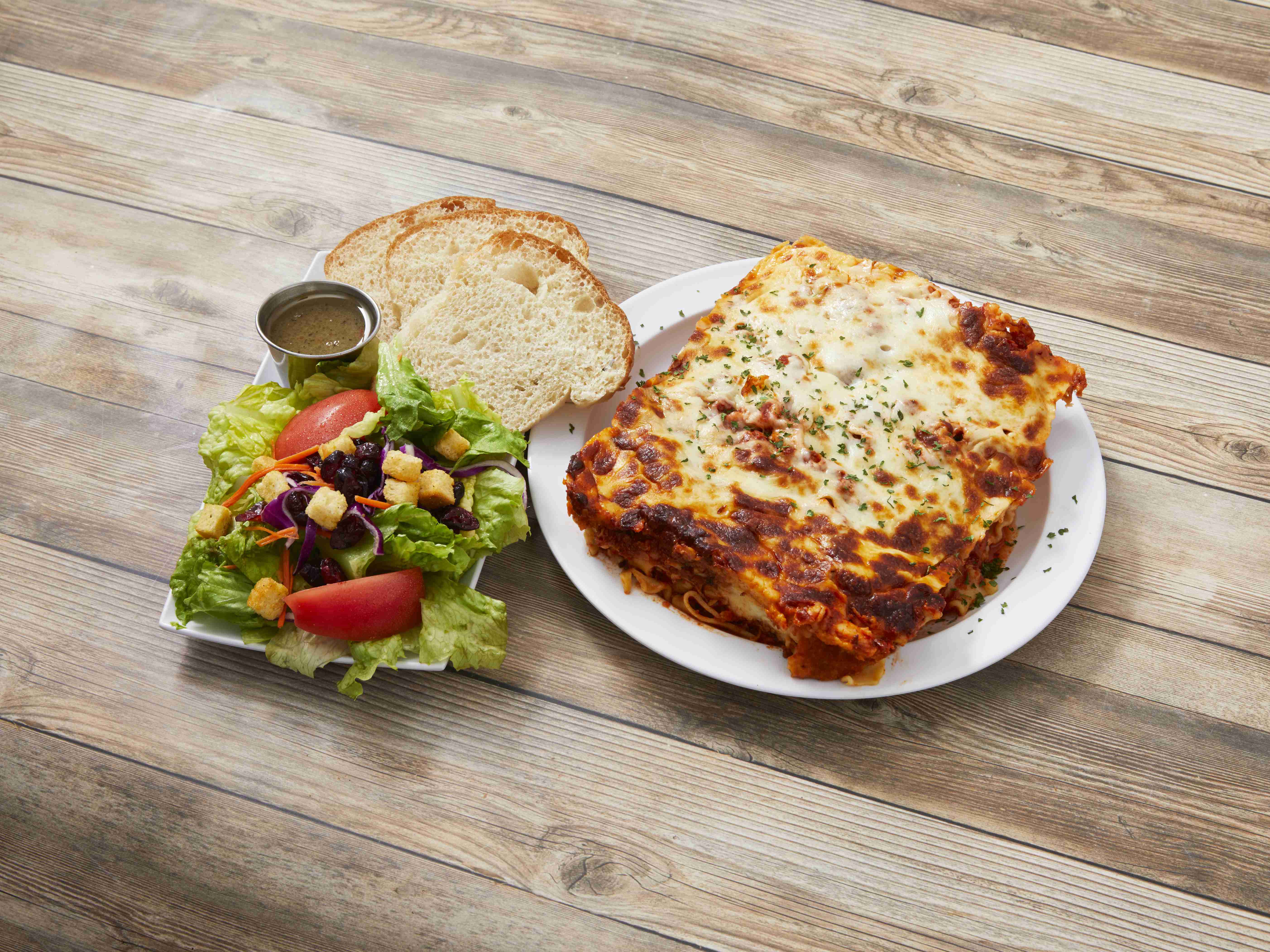 Order Lasagna food online from Latina Restaurant & Pizzeria store, Flint on bringmethat.com