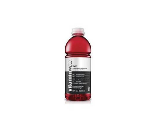 Order Vitamin Water XXX Acai Blueberry 32 oz food online from Rebel store, Henderson on bringmethat.com