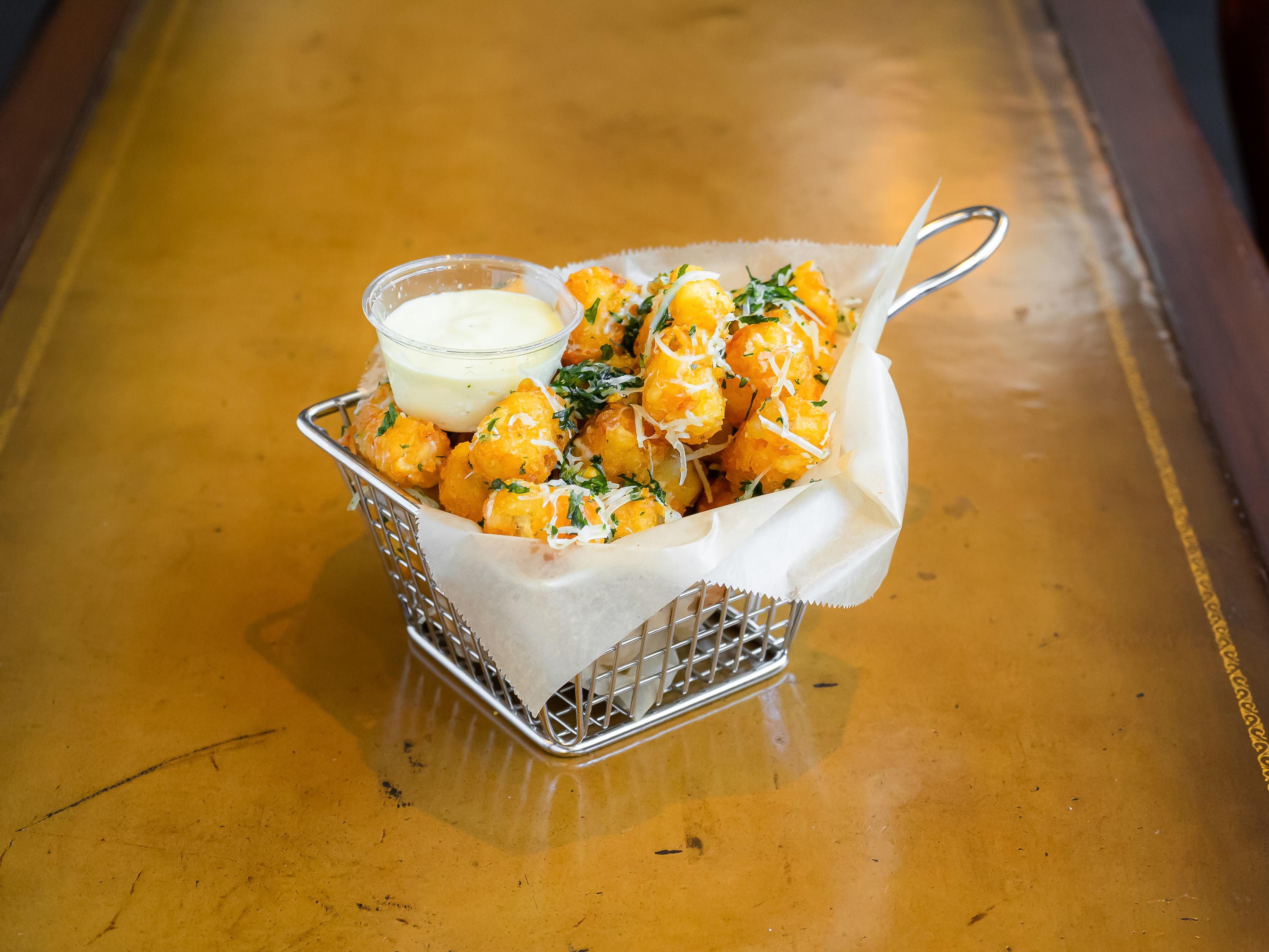 Order Teddy's Truffle Tater Tots food online from Executive Order Bar & Lounge store, San Francisco on bringmethat.com