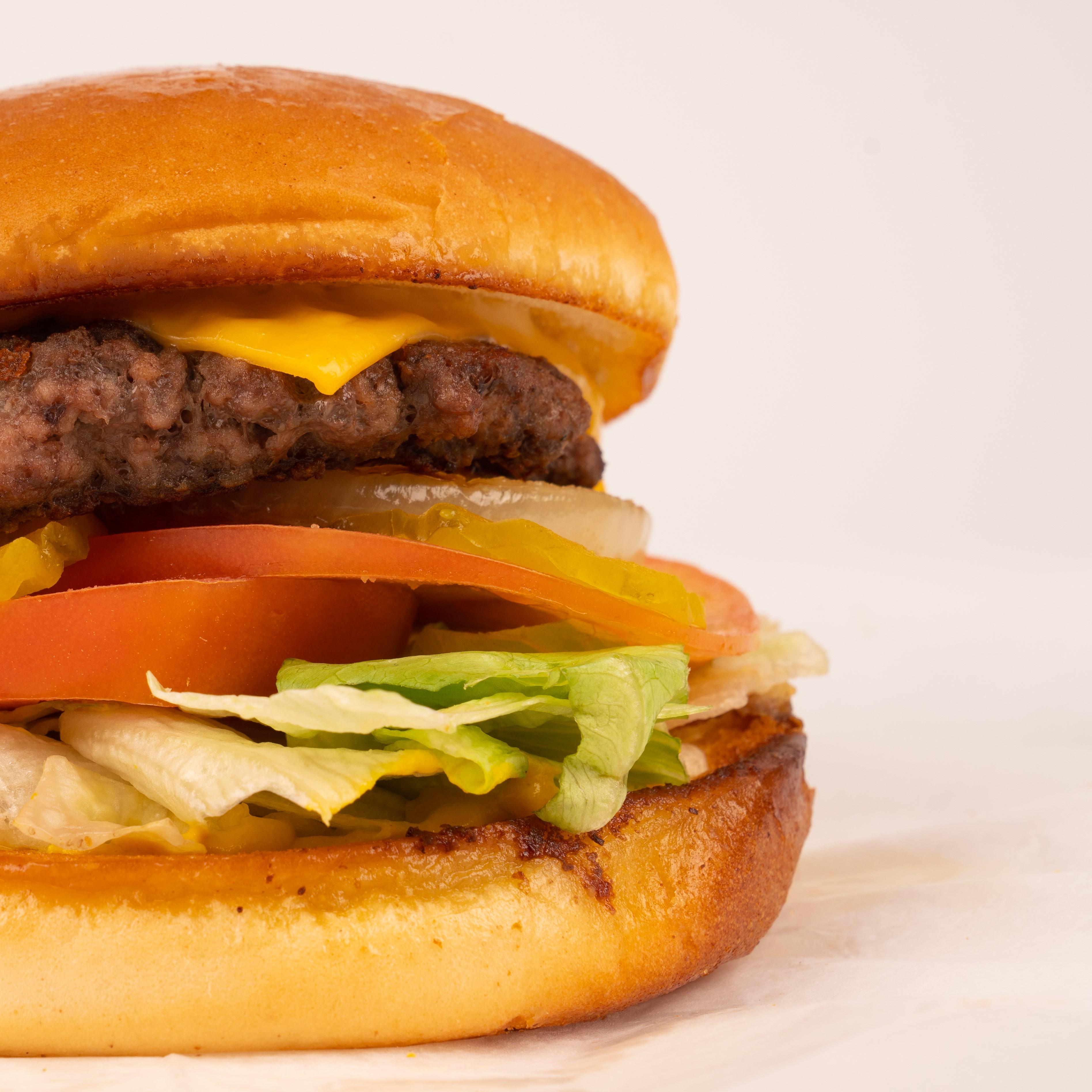 Order Cheeseburger food online from Exlines' Best Pizza In Town Bartlett store, Memphis on bringmethat.com