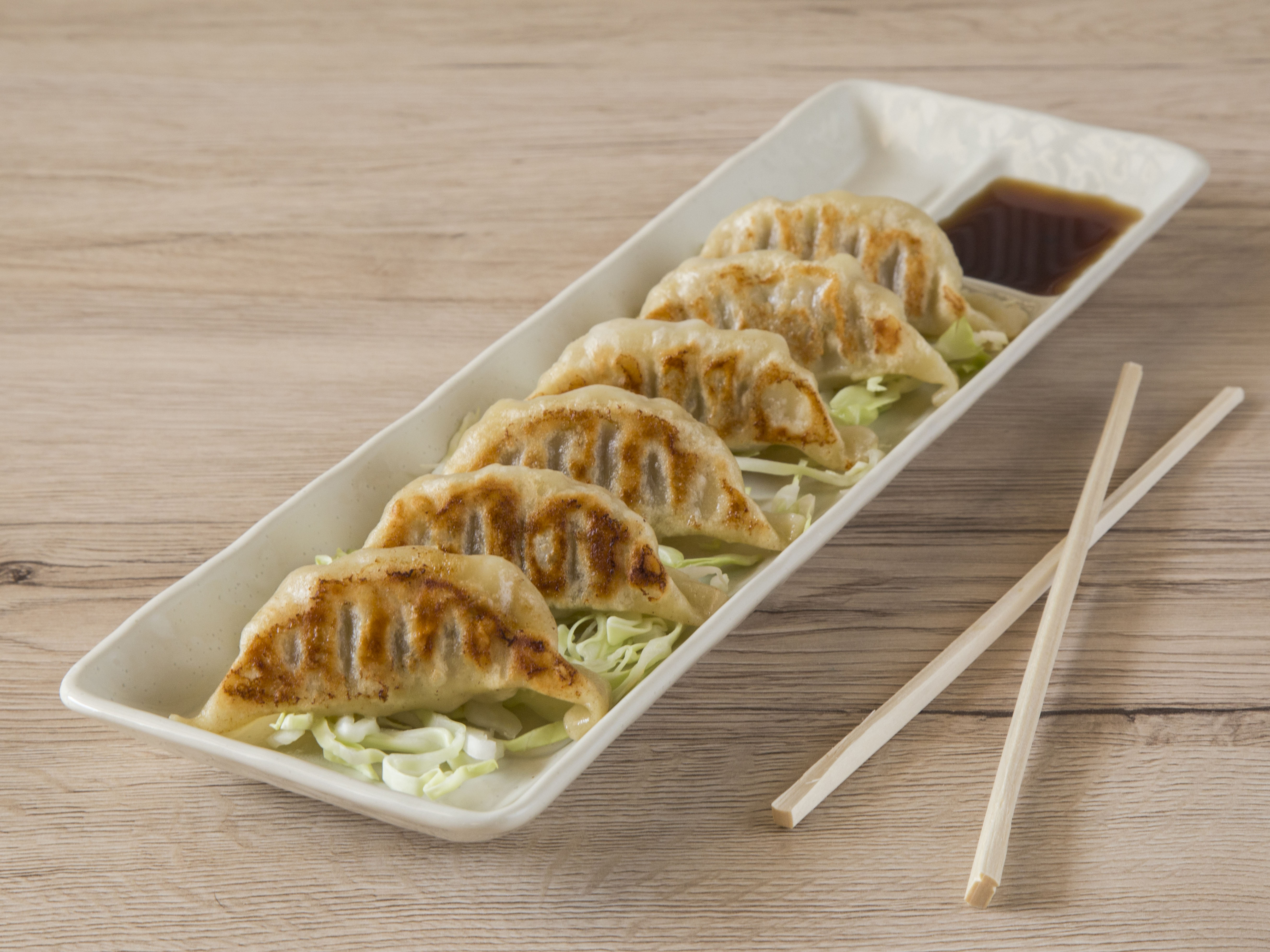 Order 6 Piece Gyoza food online from Seksun Sushi store, Chandler on bringmethat.com