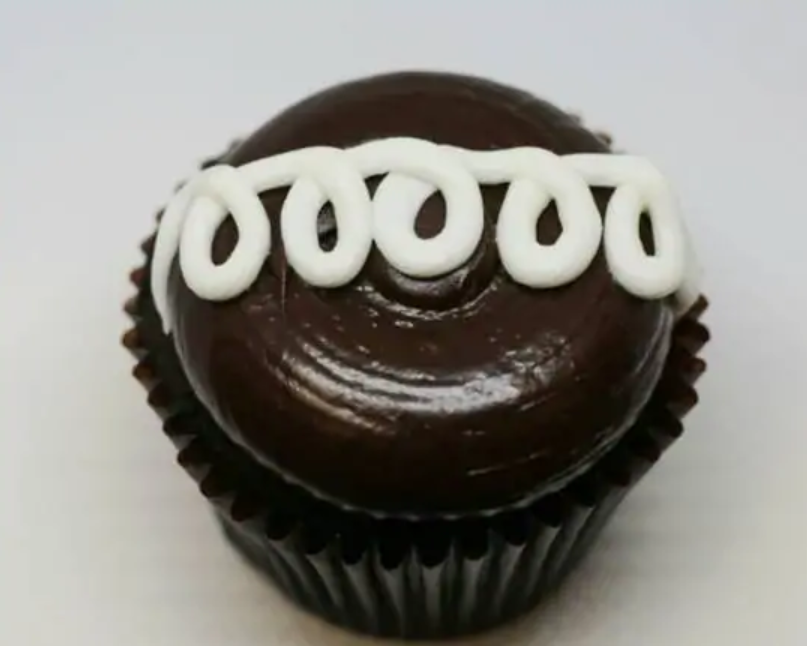 Order Chocolate Cream Cupcake food online from Smallcakes Snellville: A Cupcakery & Creamery store, Snellville on bringmethat.com