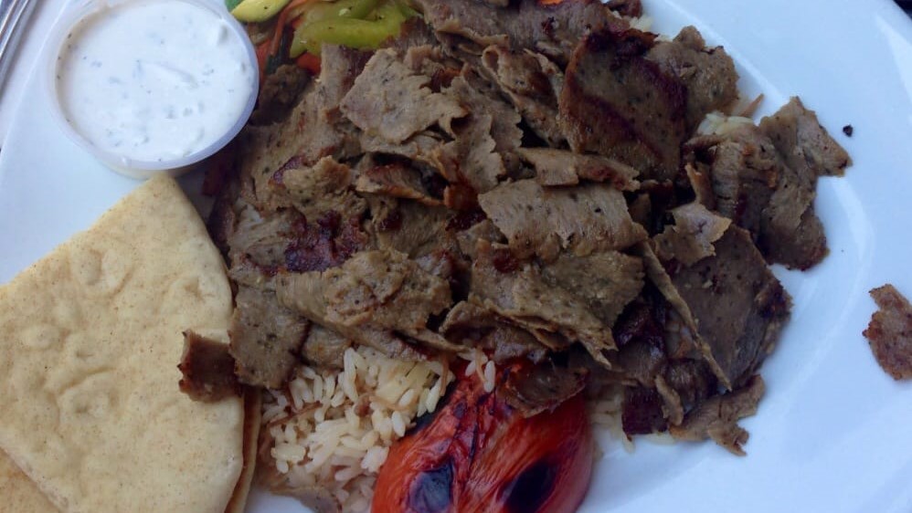 Order Gyro Plate food online from Hurricanes Bar & Grill store, Huntington Beach on bringmethat.com
