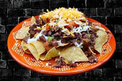 Order Steak Nachos food online from RIVAS MEXICAN GRILL store, Fort Mohave on bringmethat.com