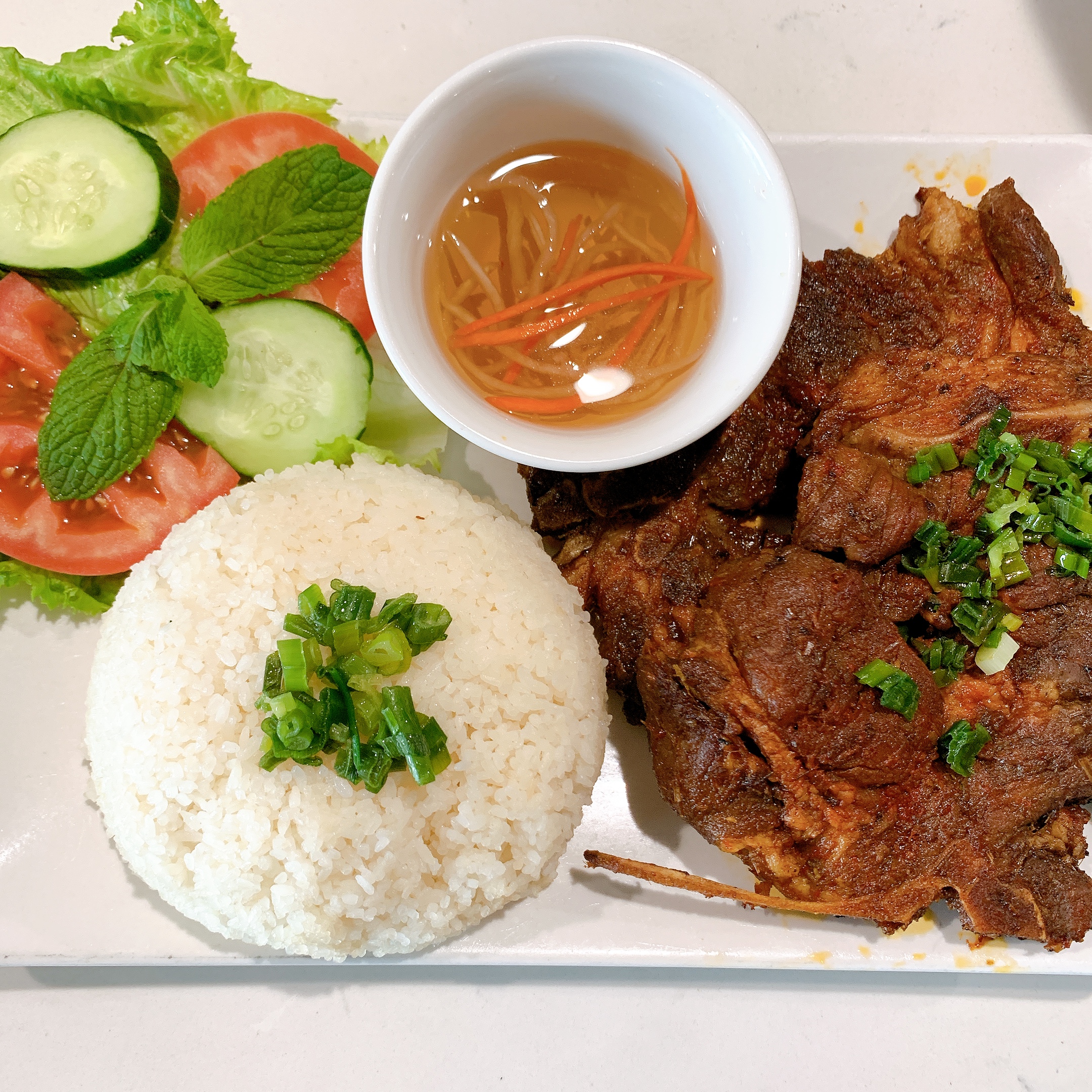 Order 36 A. Cơm Tấm Sườn Nướng - Broken Rice with Grilled Pork Chop food online from 5 Star Hue store, El Monte on bringmethat.com
