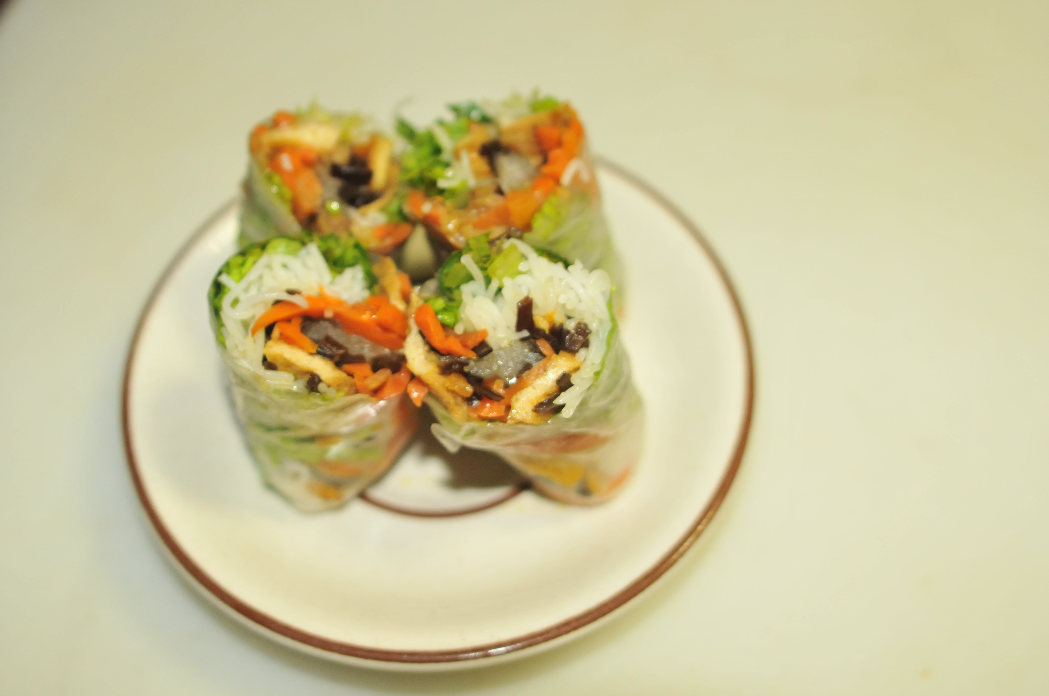 Order 3. Goi Cuon Thit Nuong/Grilled pork spring rolls food online from Pho Bistro store, Malden on bringmethat.com