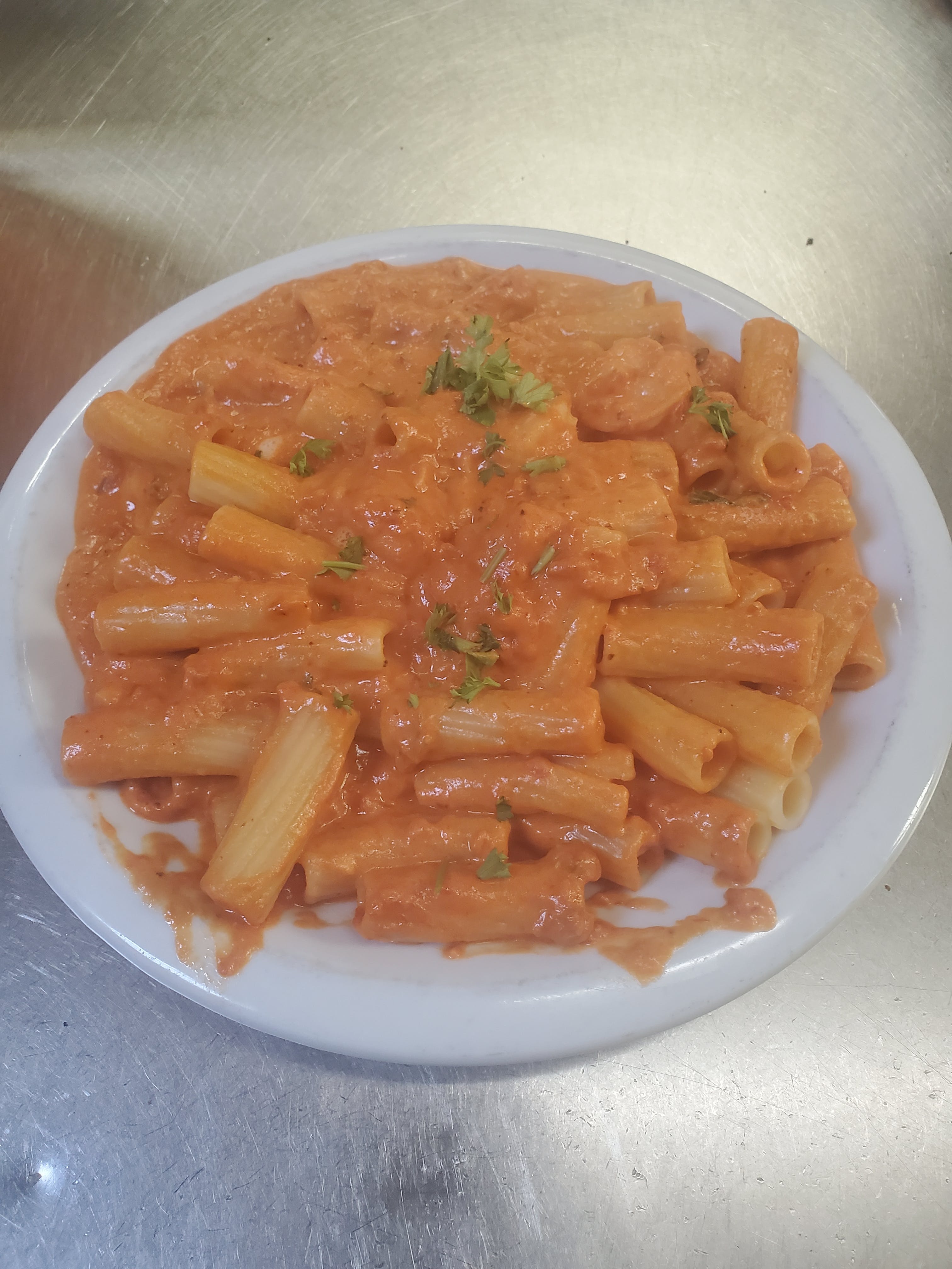 Order Rigatoni with Vodka Tomato Sauce - Pasta food online from Pizza Cucina store, Oswego on bringmethat.com