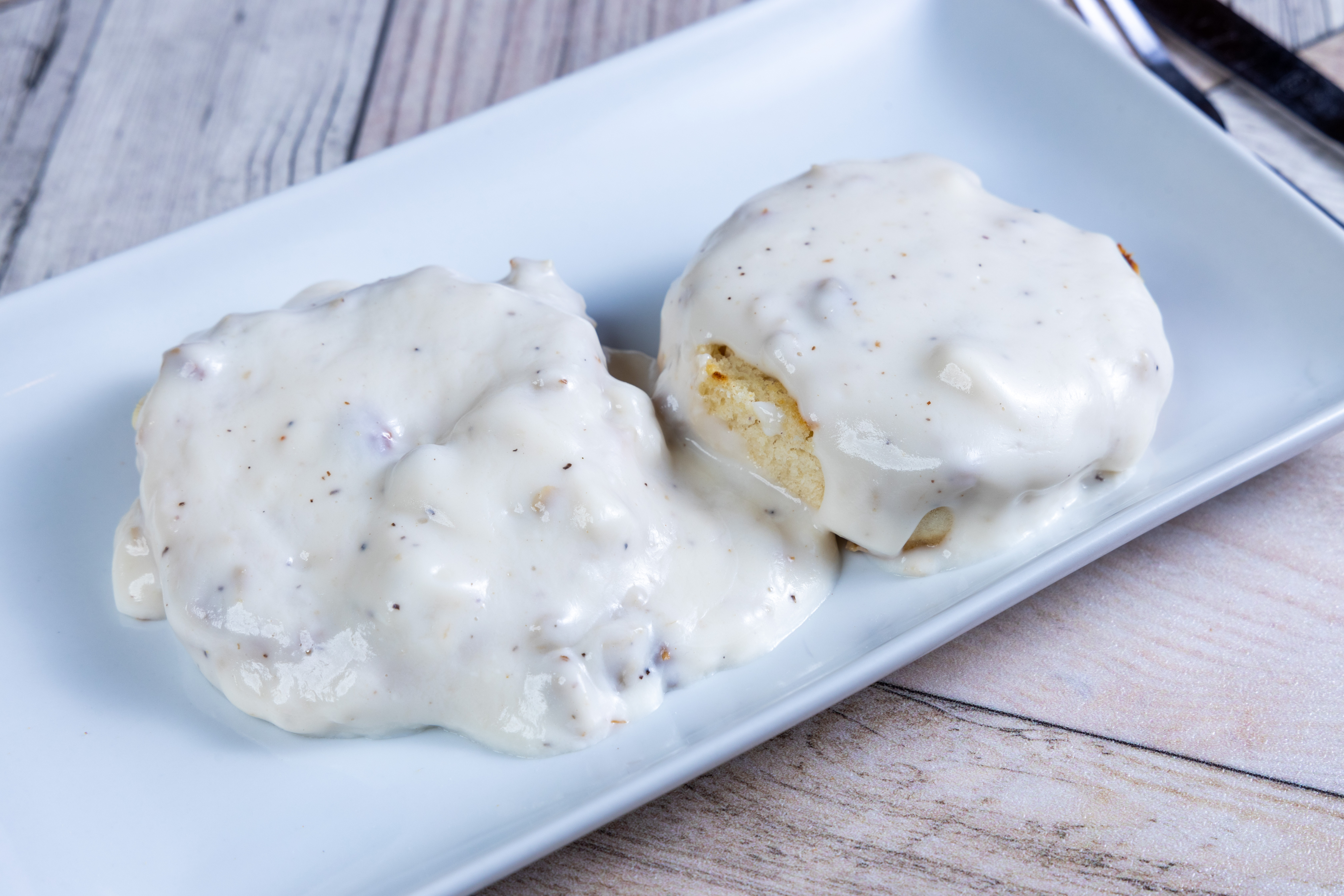 Order 1/2 order Biscuits & Gravy food online from Top View Restaurant store, Chicago on bringmethat.com