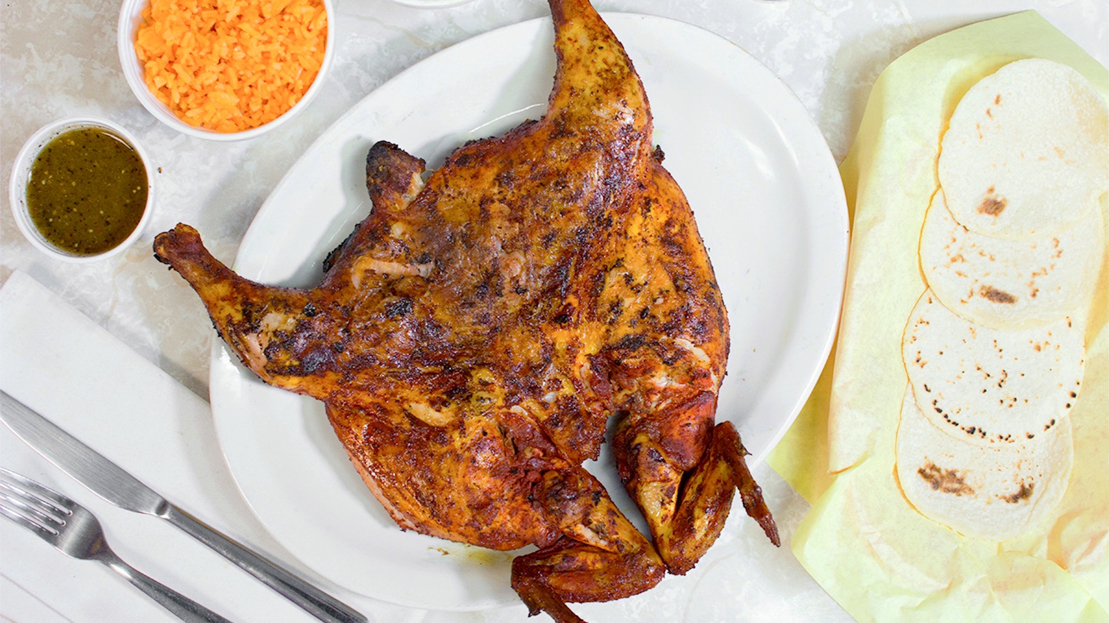 Order 1 Whole Chicken and 2 Sides Combo Meal food online from Charcoal Grill Chicken store, Santa Clarita on bringmethat.com