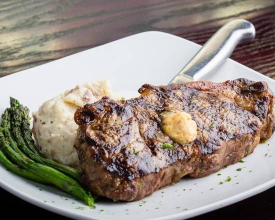 Order Hand Cut NY Strip food online from Sedona Taphouse store, Glen Allen on bringmethat.com