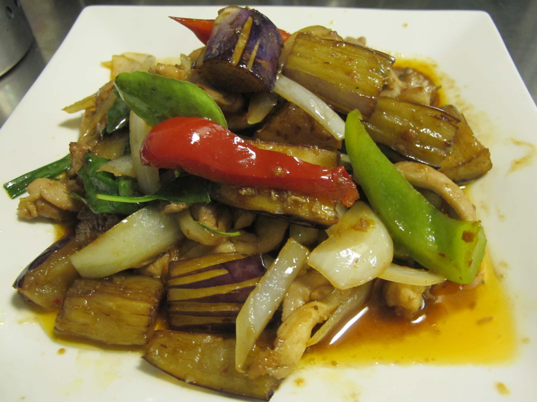 Order 85. Pad Eggplant* food online from Thailand Restaurant store, Modesto on bringmethat.com
