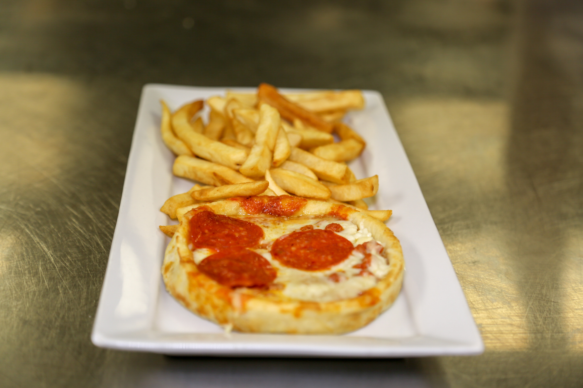 Order I. Kid's Pepperoni Pizza with French Fries food online from El Tapatio store, Raleigh on bringmethat.com