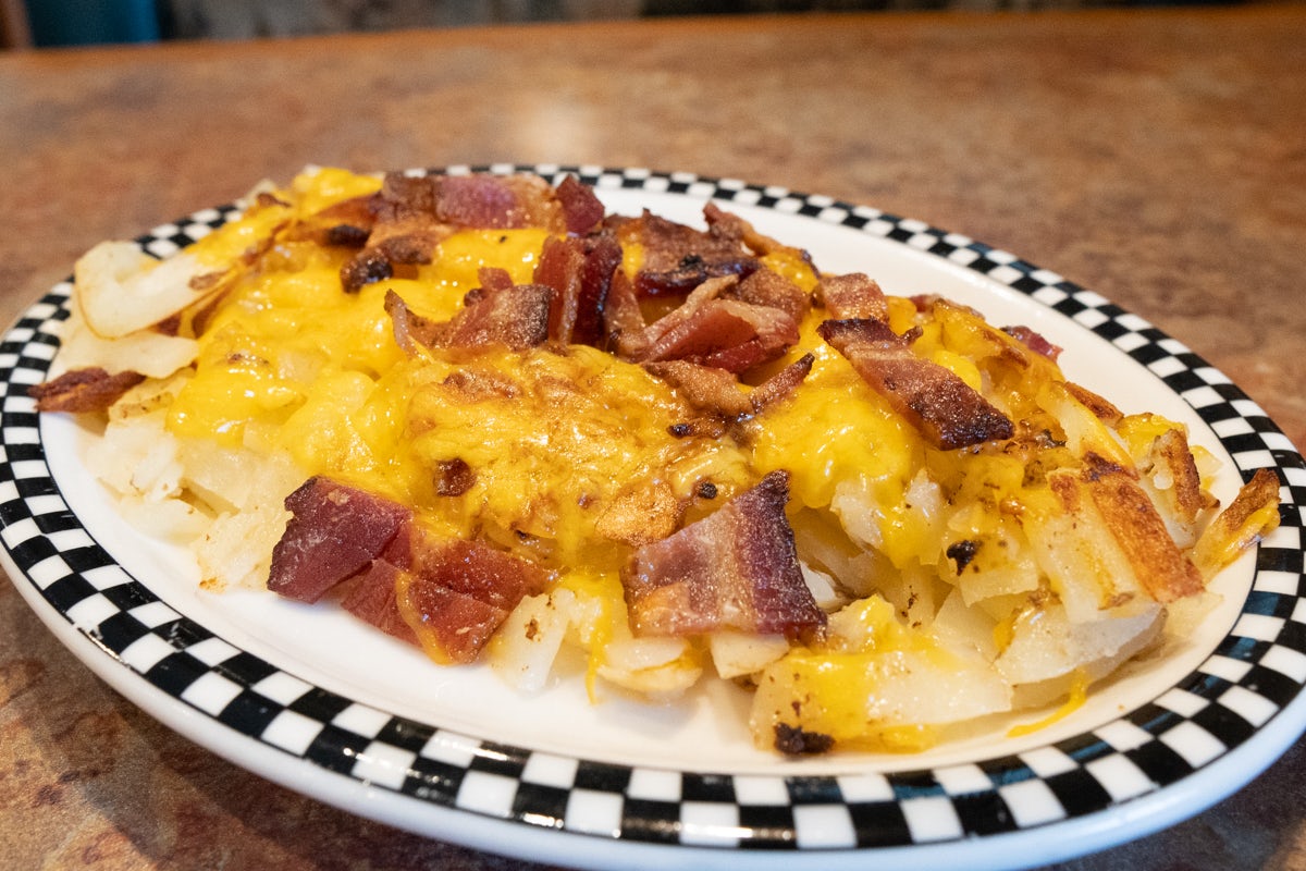 Order Side of Loaded Potato food online from Black Bear Diner store, Colorado Springs on bringmethat.com