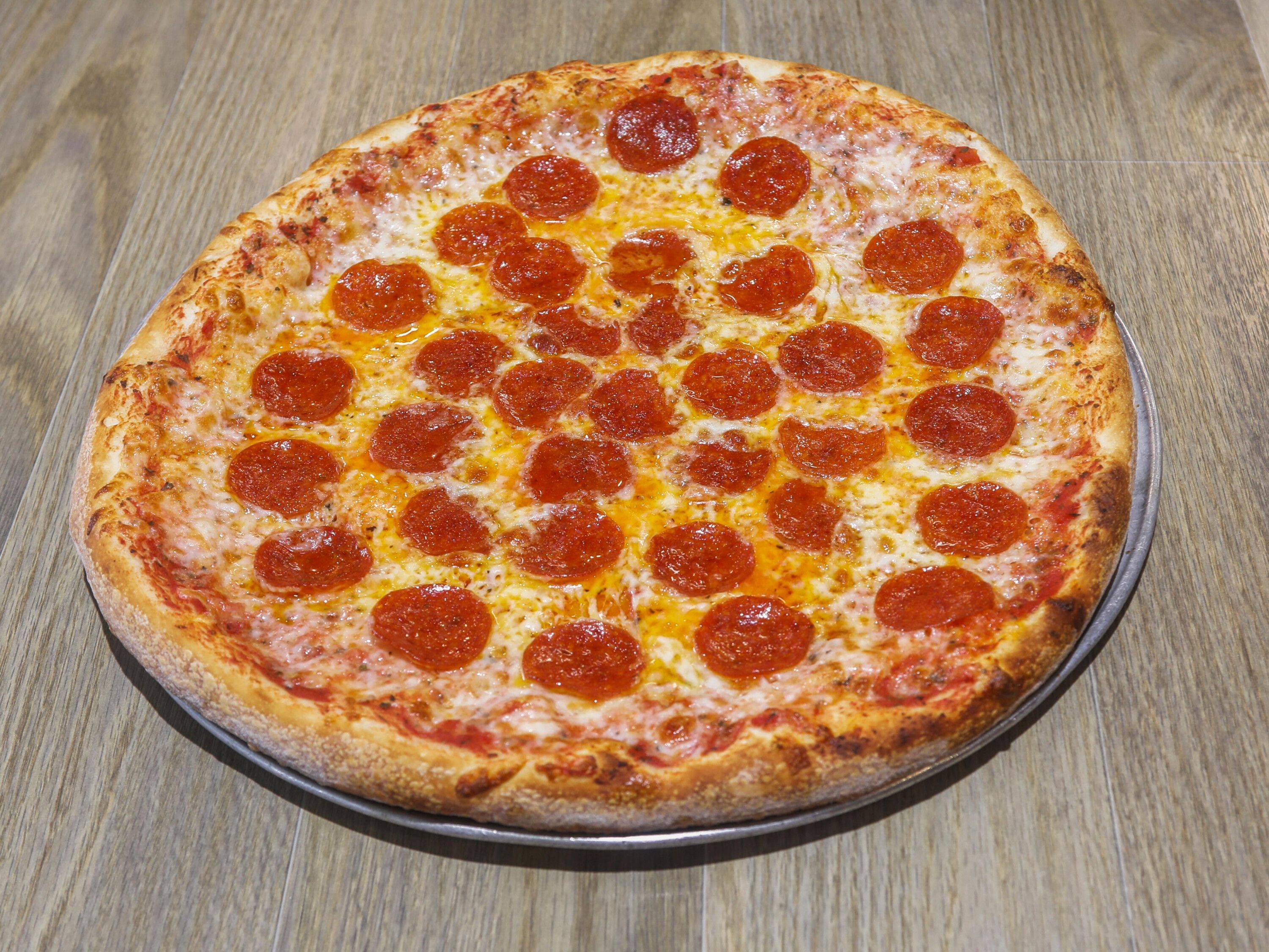 Order Pepperoni Pounder Pizza food online from Milania's NY Pizza store, Adairsville on bringmethat.com