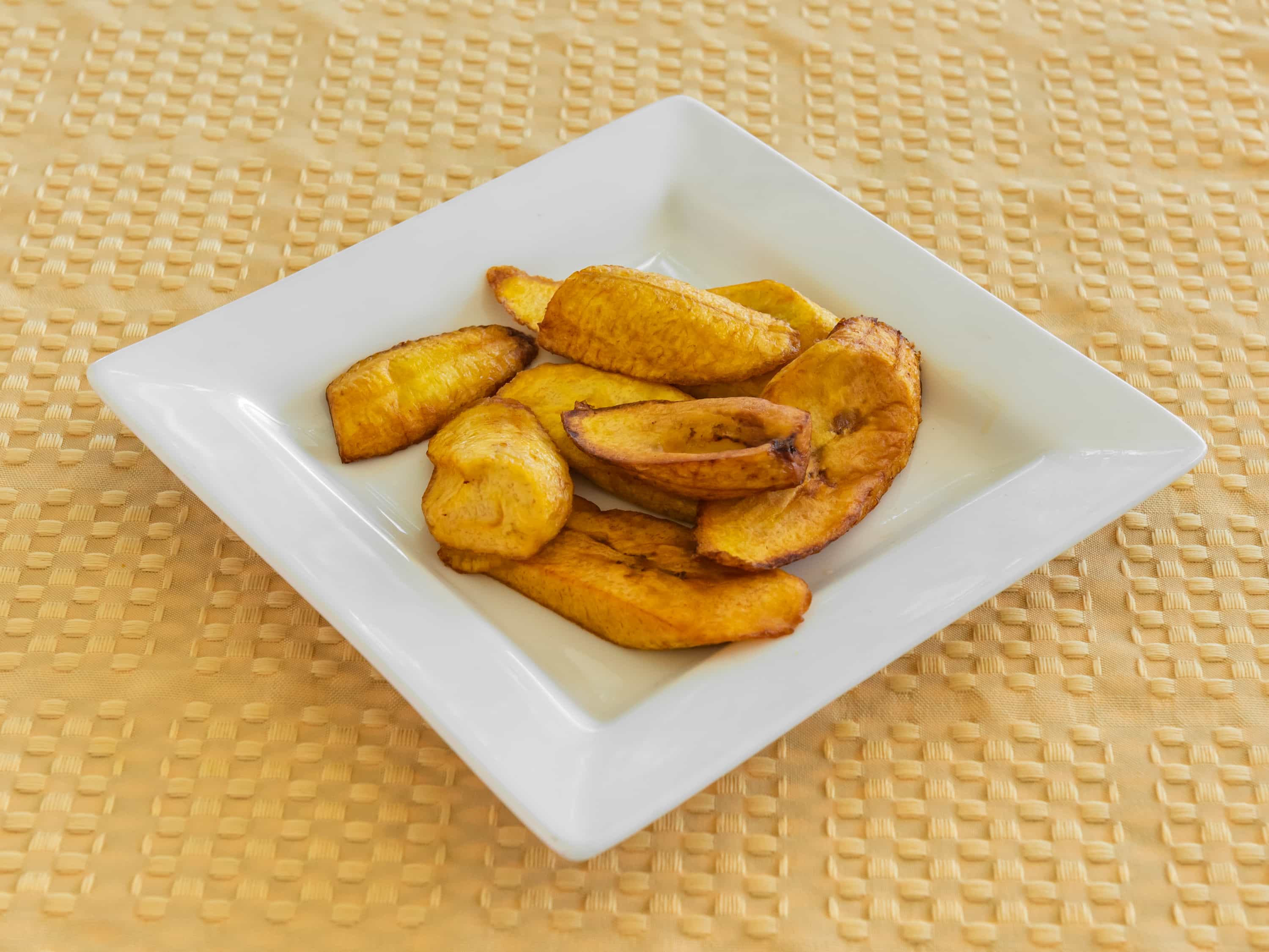 Order Fried Plantains food online from Iwayne Caribbean Kitchen store, Manor on bringmethat.com