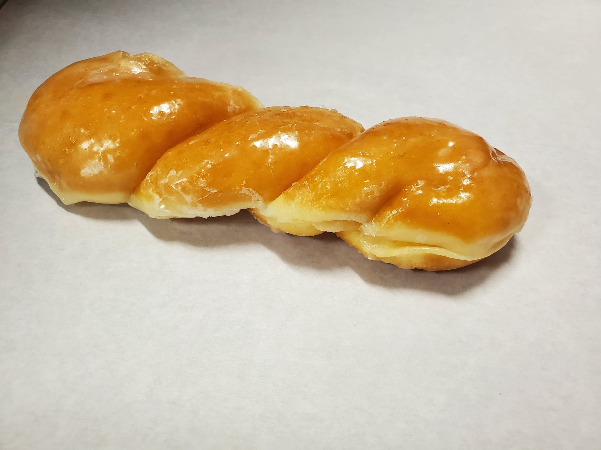 Order Glaze Twist food online from Honey Donuts store, Crowley on bringmethat.com