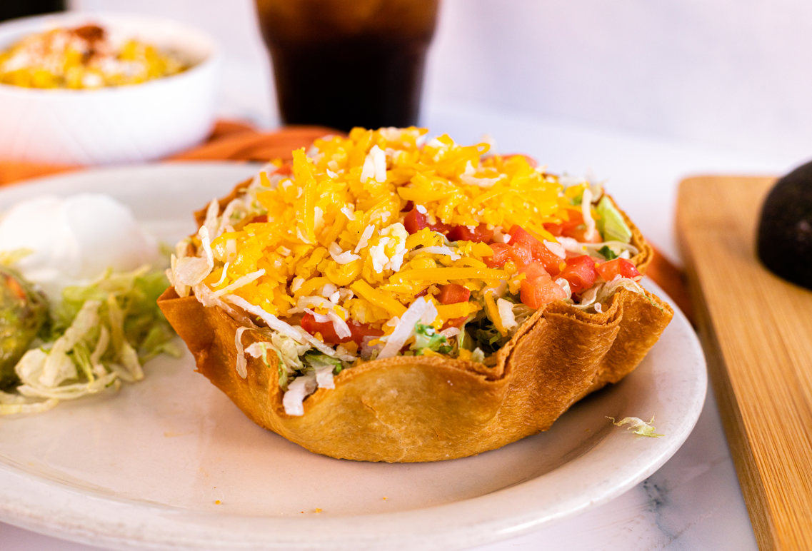 Order Taco Salad food online from Chelinos Mexican Restaurant store, Oklahoma City on bringmethat.com