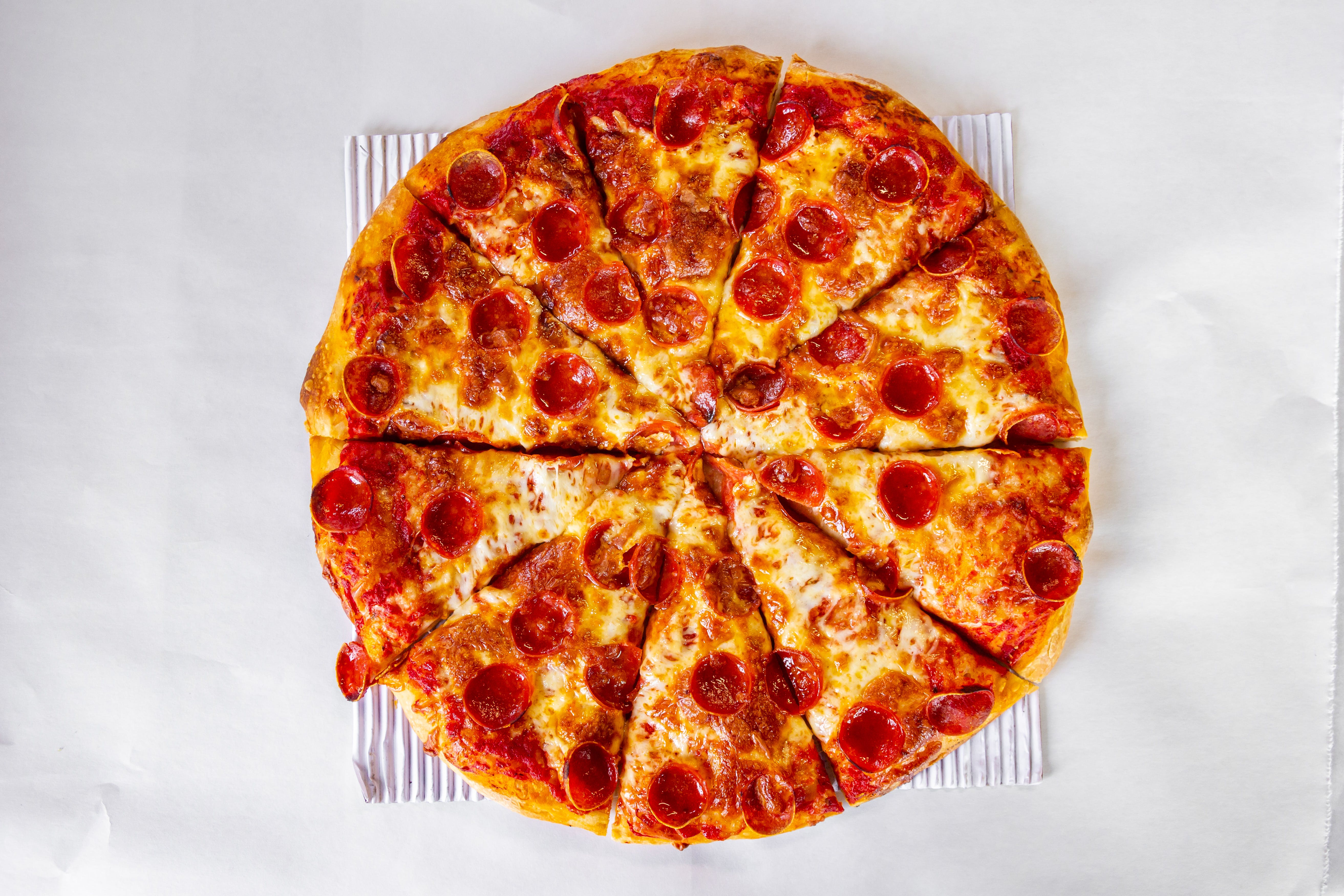 Order 1-Topping Cheese Pizza - Small 10" food online from Danny Pizza & Subs store, Taylor on bringmethat.com