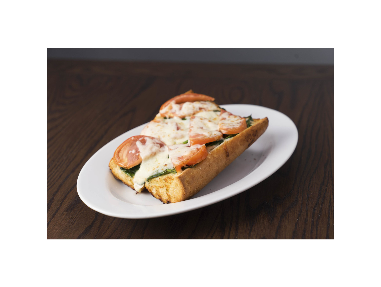 Order Garlic Bread Spinach and Tomato food online from Rosati's Pizza store, Lindenhurst on bringmethat.com
