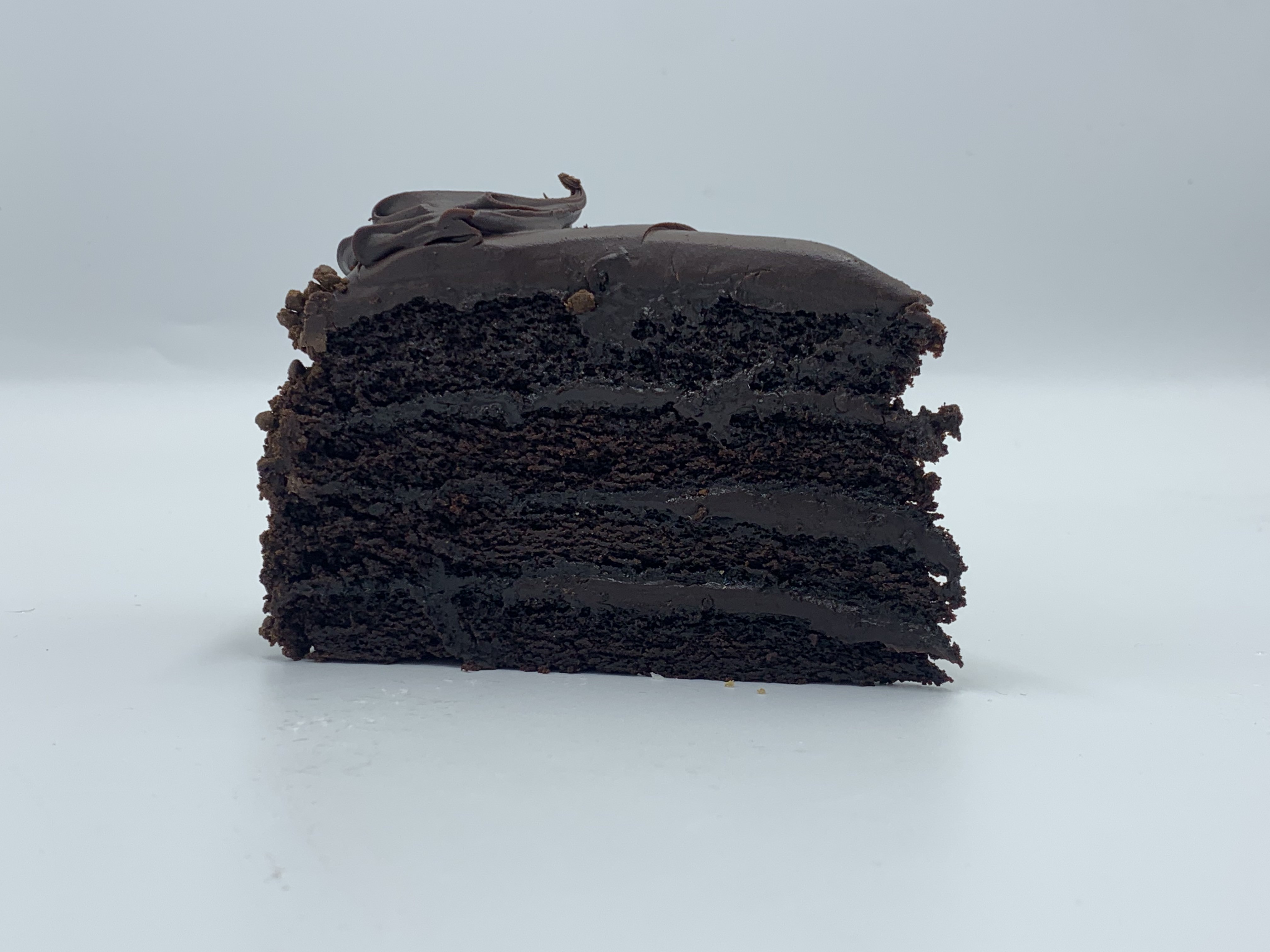 Order FOUR LAYER CHOCOLATE FUDGE CAKE food online from Pit Rib House store, Hickory Hills on bringmethat.com