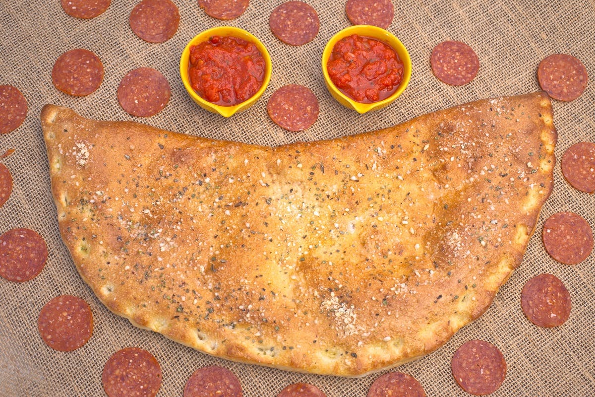 Order Create Your Own Calzone - Calzone food online from La Casa De Pizzeria store, Troy on bringmethat.com