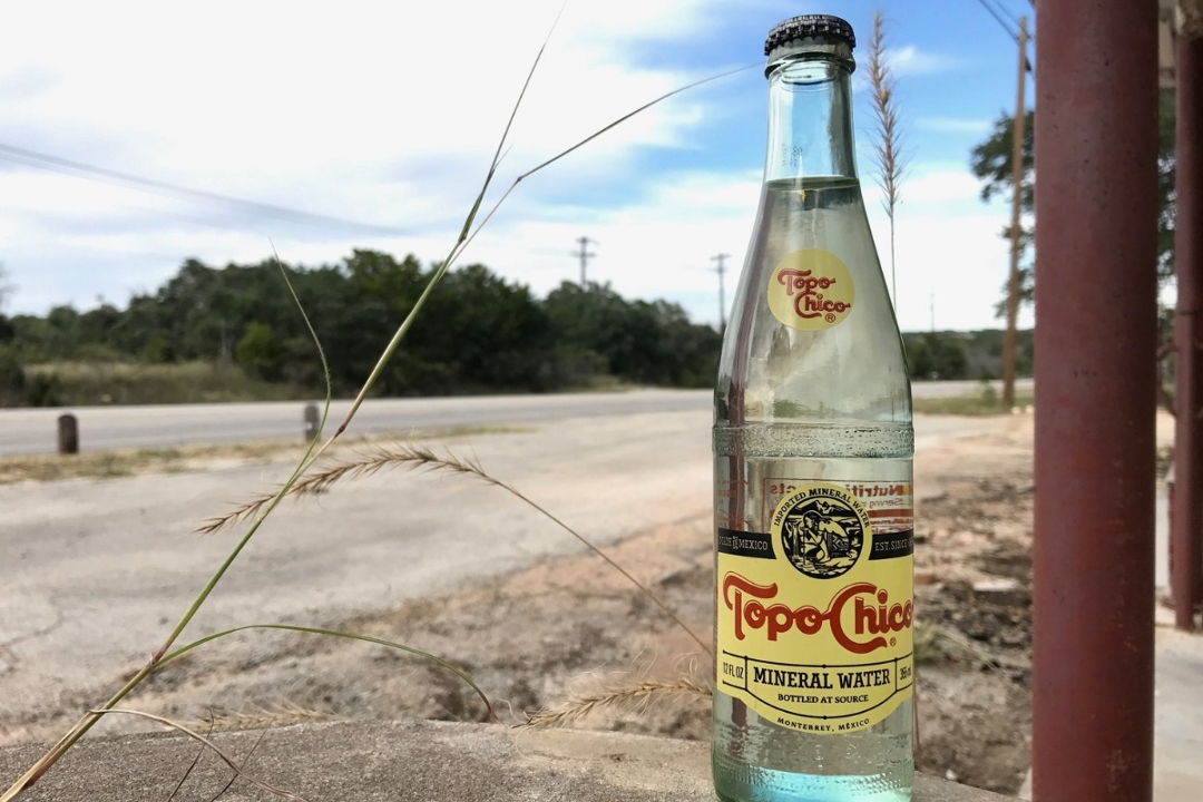 Order Topo Chico  food online from Kick Butt Café store, Austin on bringmethat.com