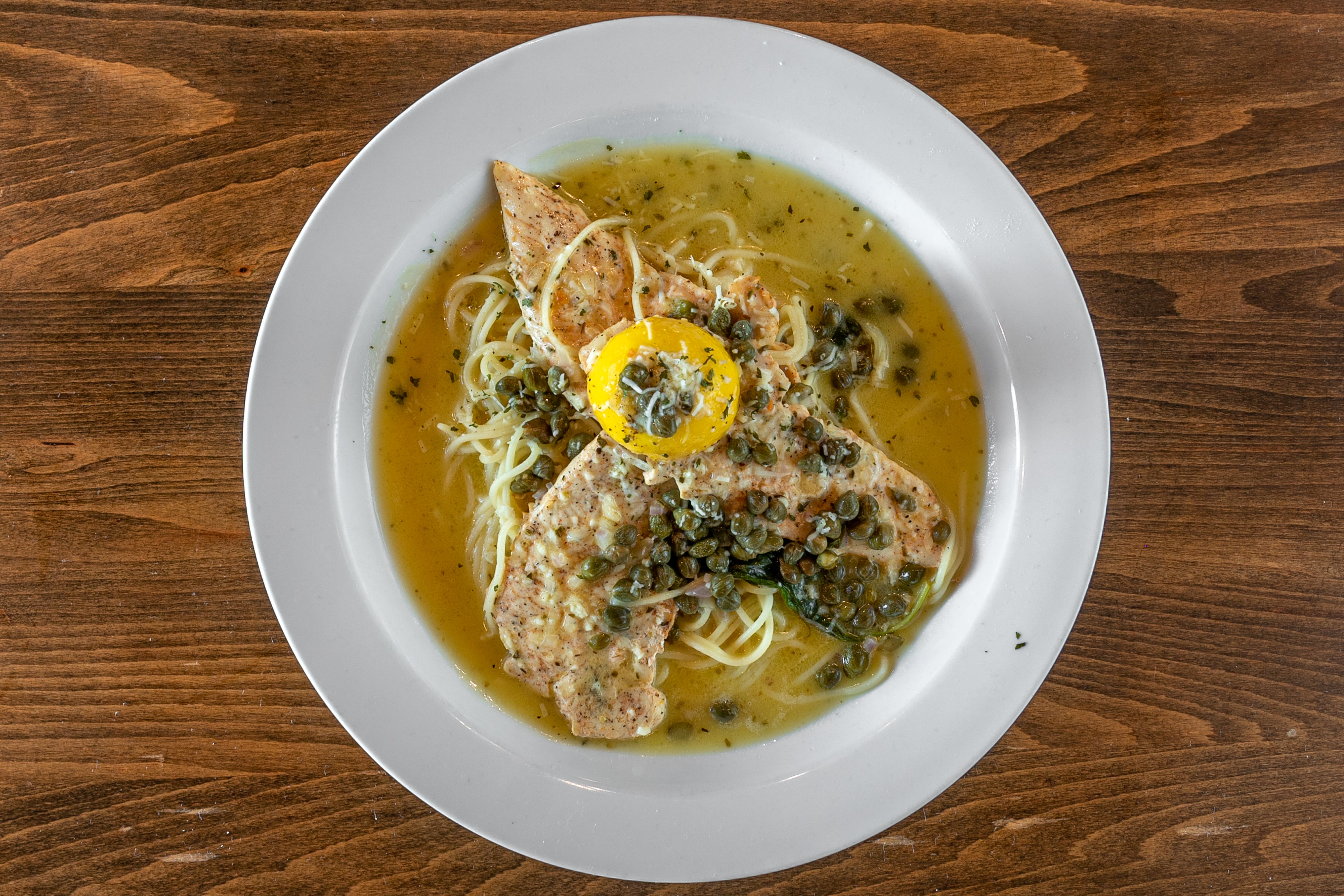 Order Chicken Piccata - Entree food online from Gianni Italian Bistro store, Heath on bringmethat.com